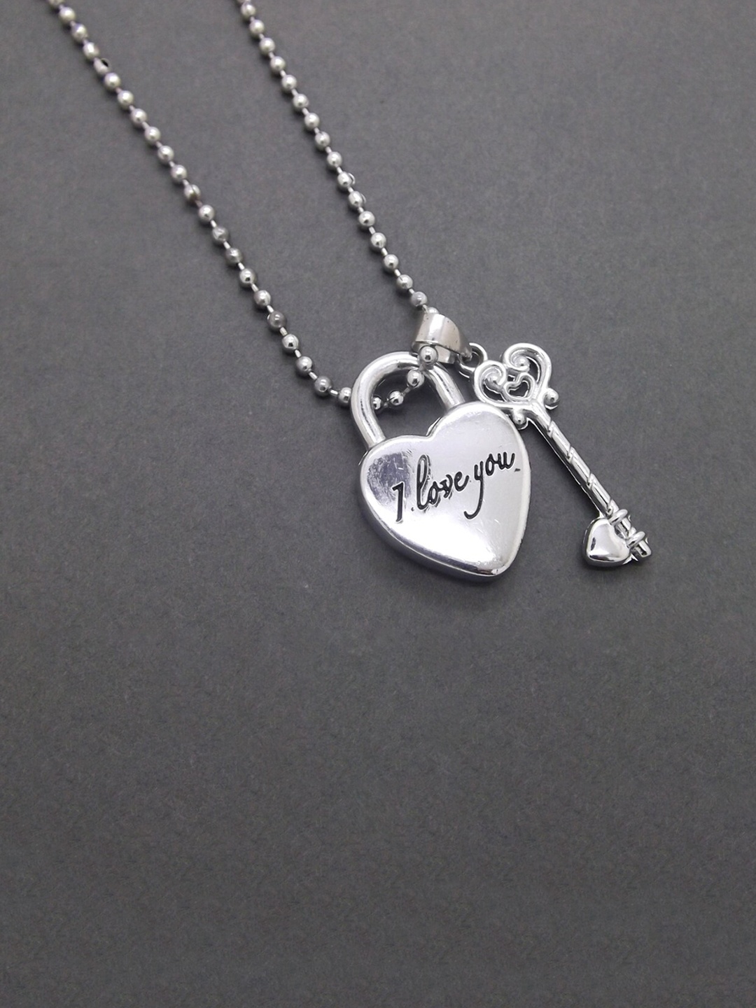 

FEMMIBELLA Men Silver-Plated Heart Shaped Pendant With Chain