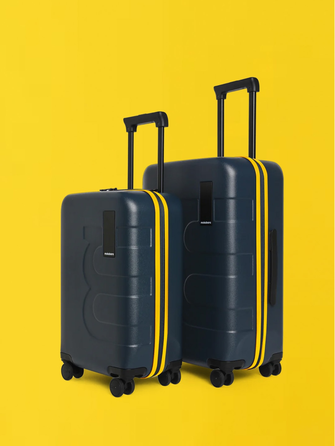 

MOKOBARA The Em Set Of 2 Textured Hard-Sided Trolley Suitcases, Blue