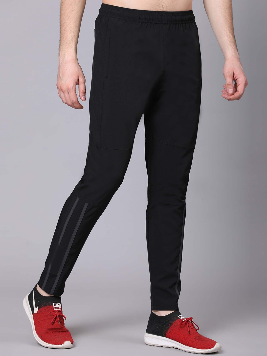 

Dpassion Men Regular-Fit Sports Track Pants, Black
