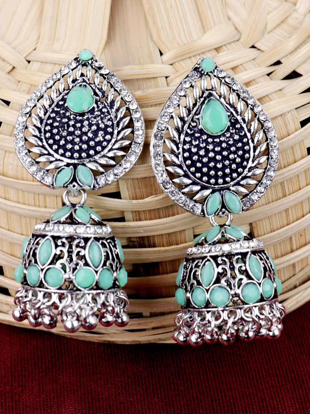 

Krelin Silver-Plated Stone-Studded Oxidised Dome Shaped Jhumkas Earrings, Sea green