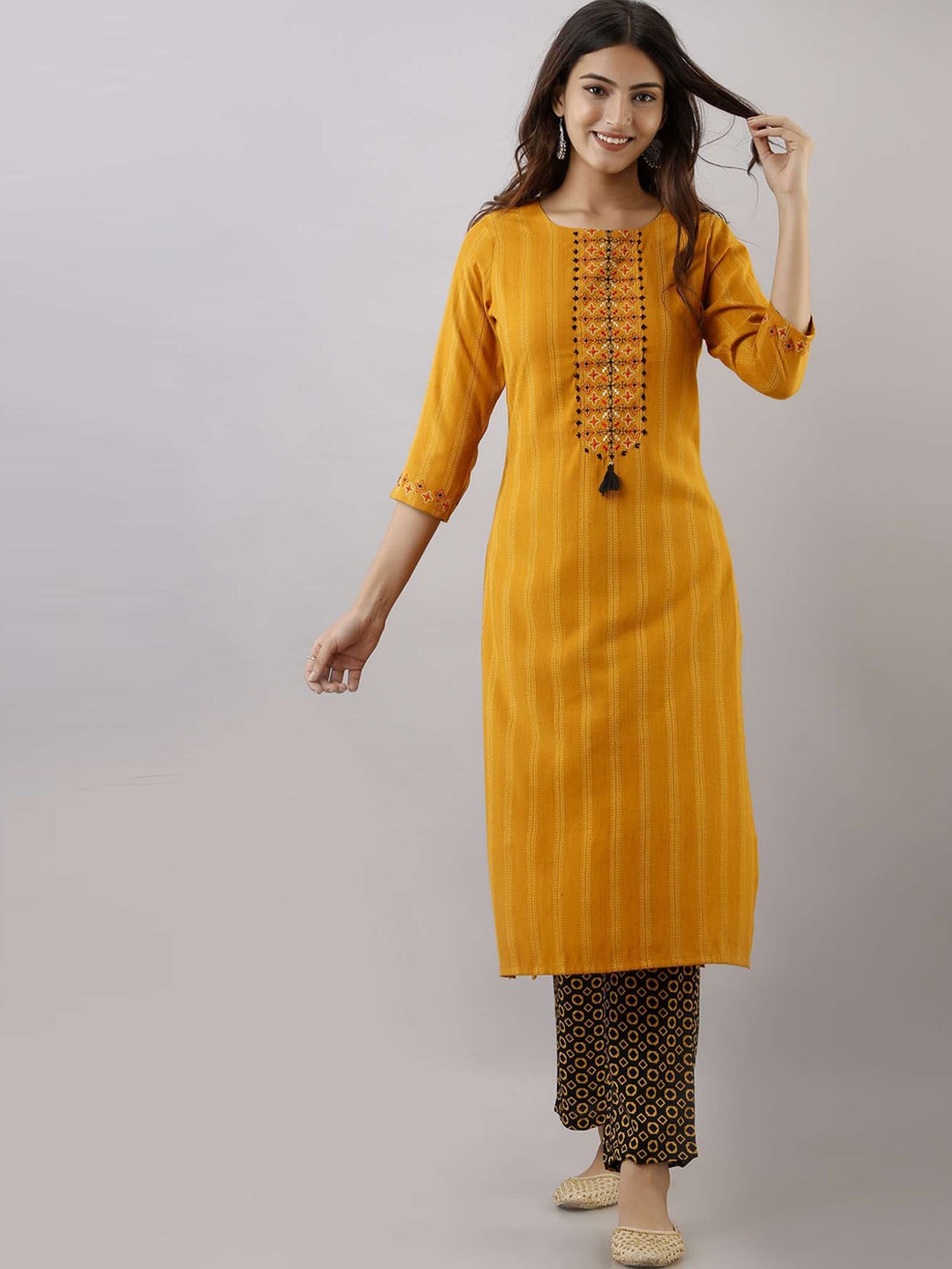 

Nehamta Woven Design Thread Work Straight Kurta With Trousers, Mustard