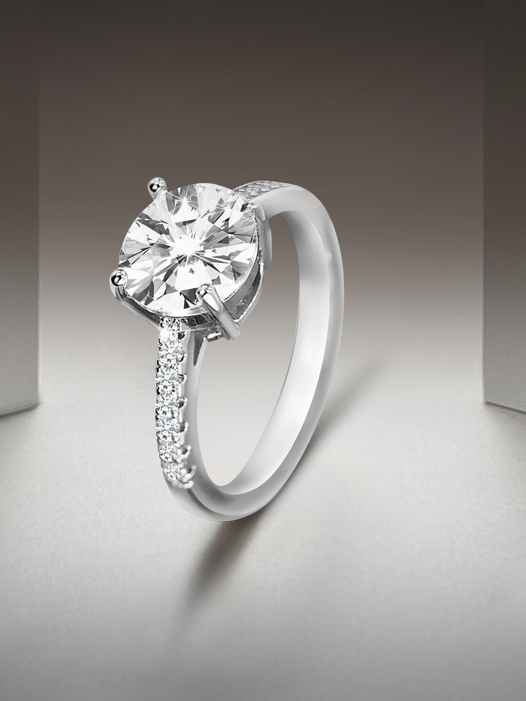 

Peora Silver-Plated AD-Studded Adjustable Finger Ring