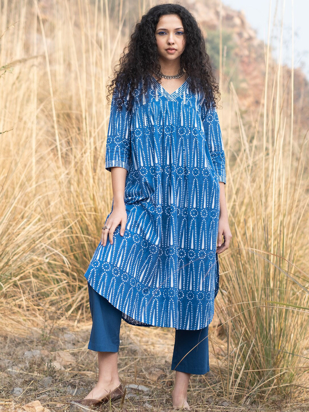 

AKISO Ethnic Motifs Printed Pleated A-Line Curved Pure Cotton Kurta with Trousers, Navy blue