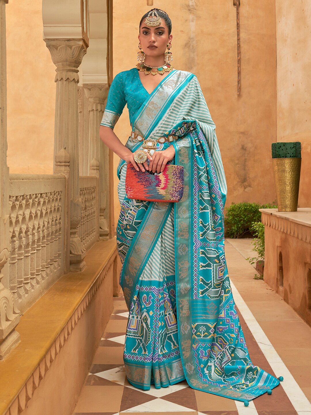

Anouk Embellished Leheriya Silk Blend Patola Saree, Blue