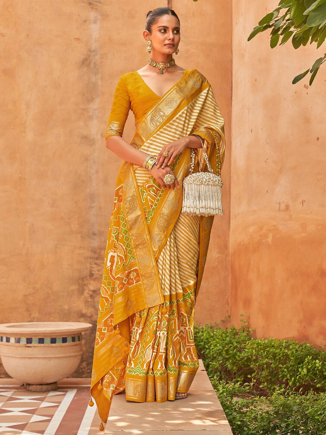 

Anouk Leheriya Printed Patola Saree, Mustard