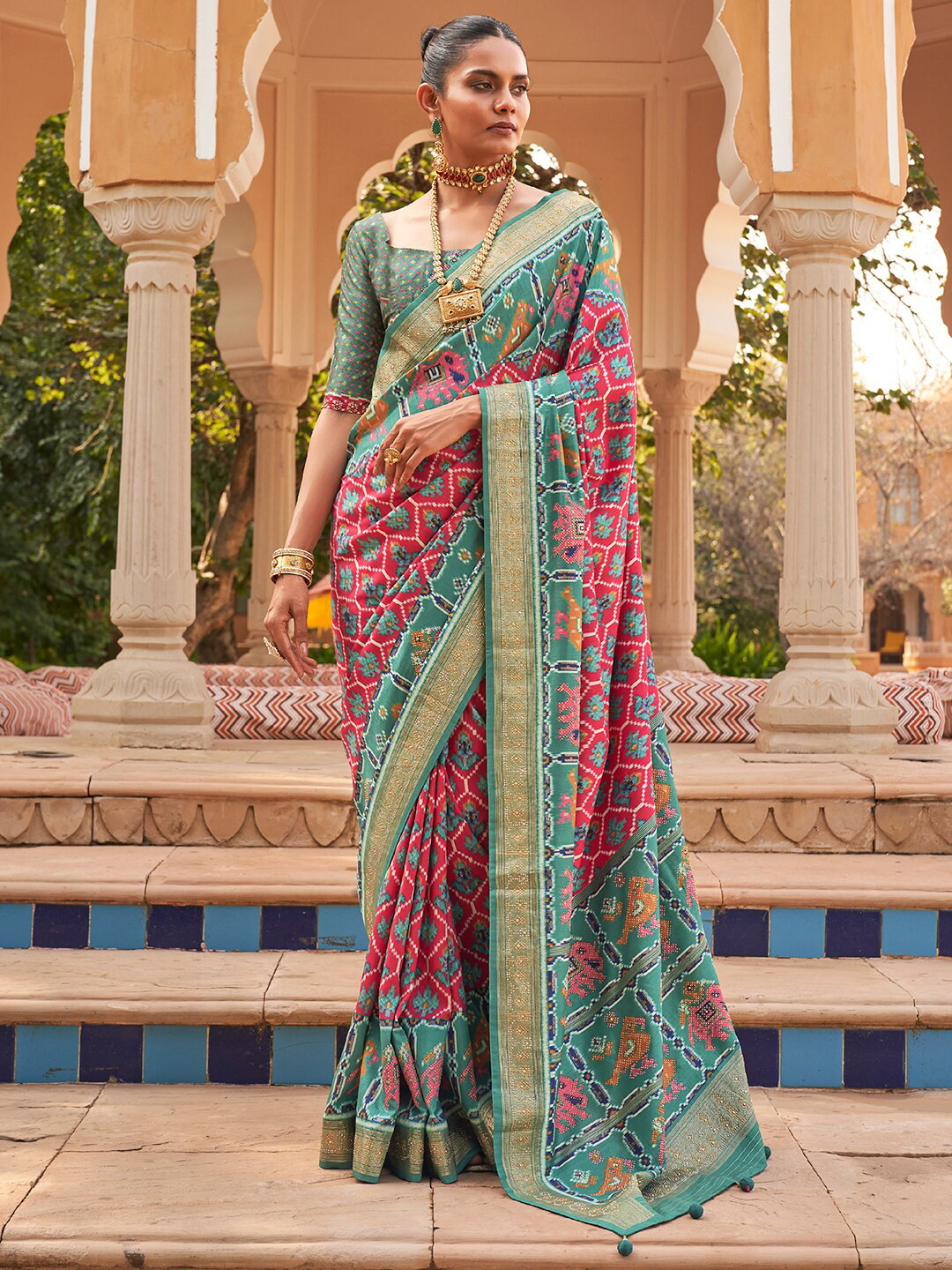 

Anouk Pink Ethnic Motifs Printed Embellished Patola Saree