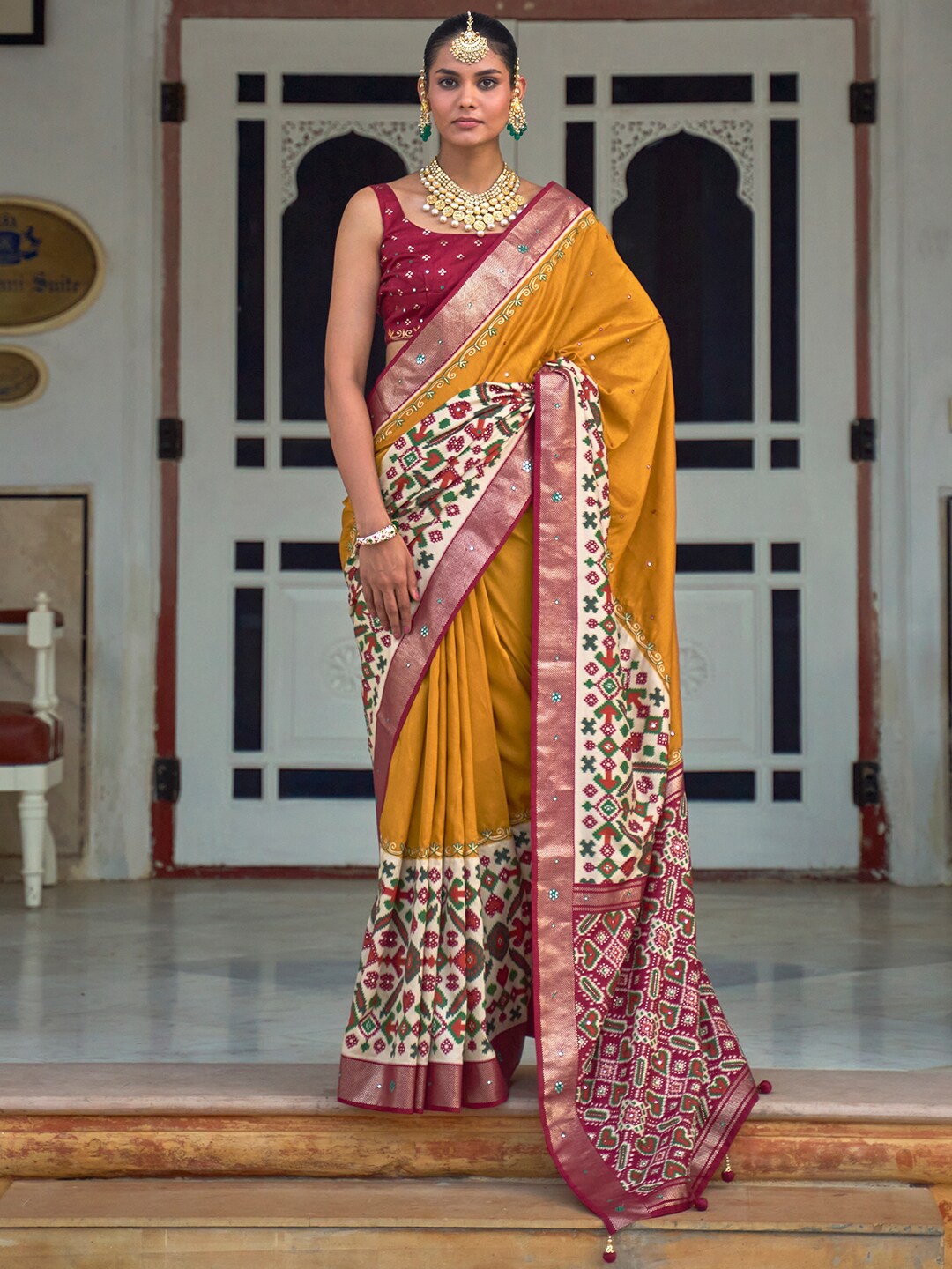 

Anouk Ethnic Motifs Printed Mirror Work Pochampally Saree, Mustard