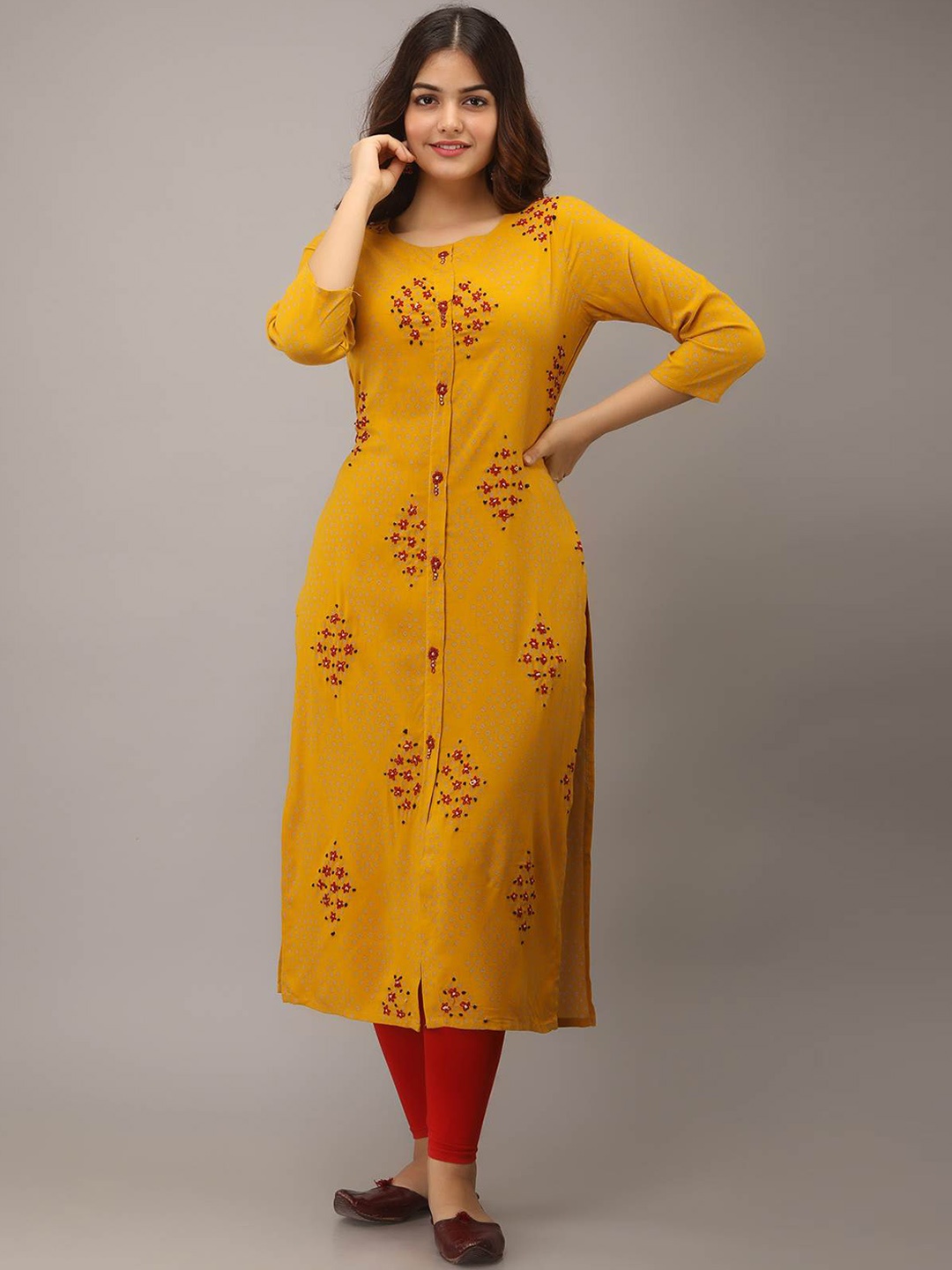 

Nehamta Women Yellow Quirky Embroidered Mirror Work Kurta