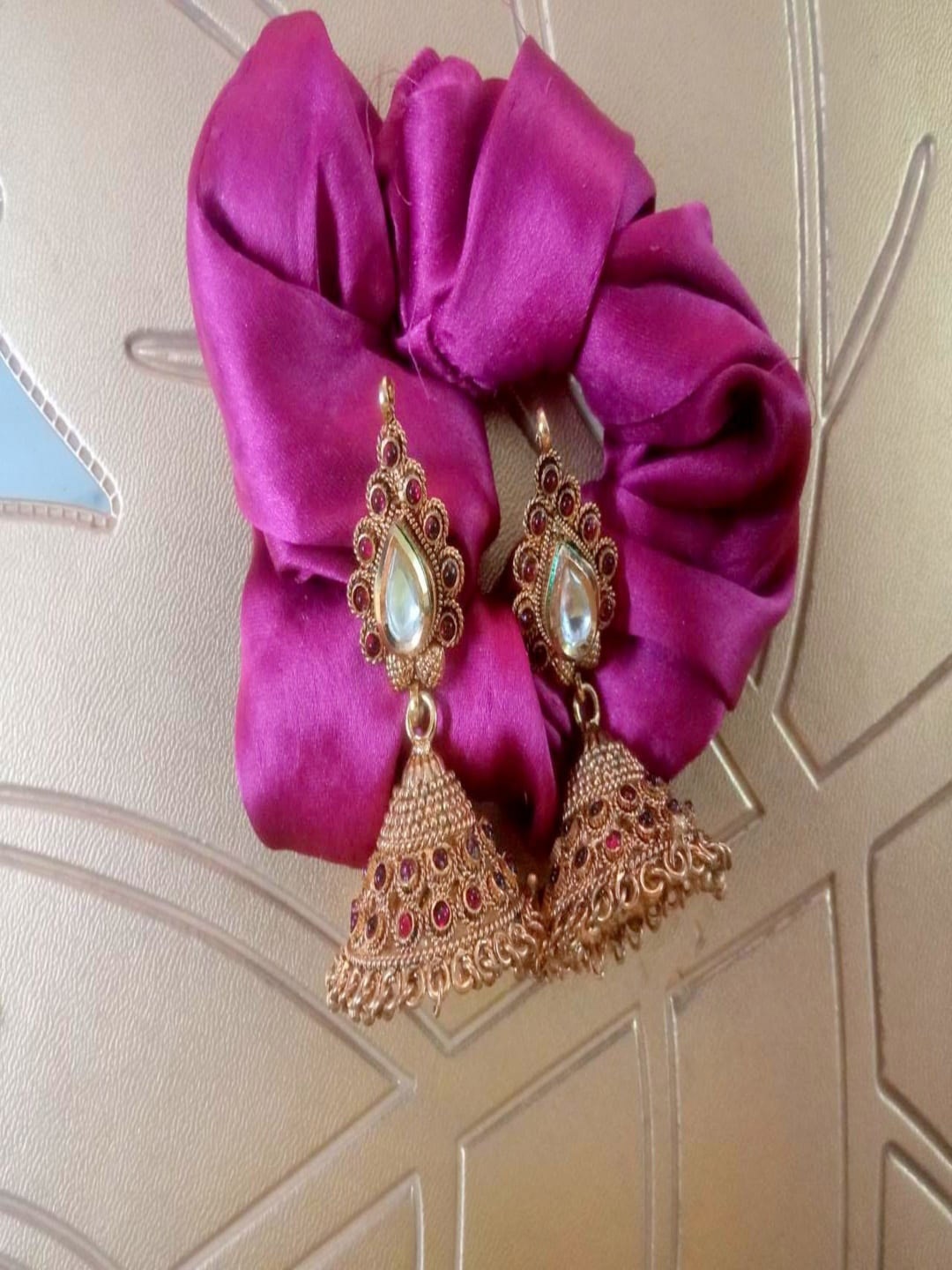 

Runjhun Gold-Plated Jhumkas Earrings