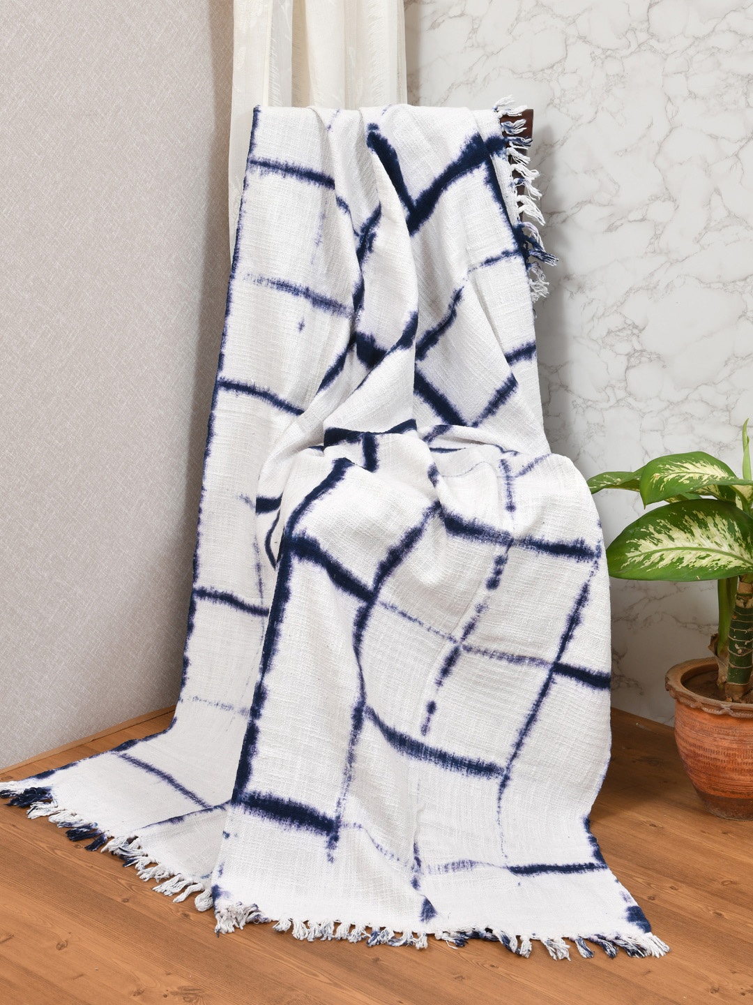 

Gulaab Jaipur White & Blue Self-Design Cotton Throw