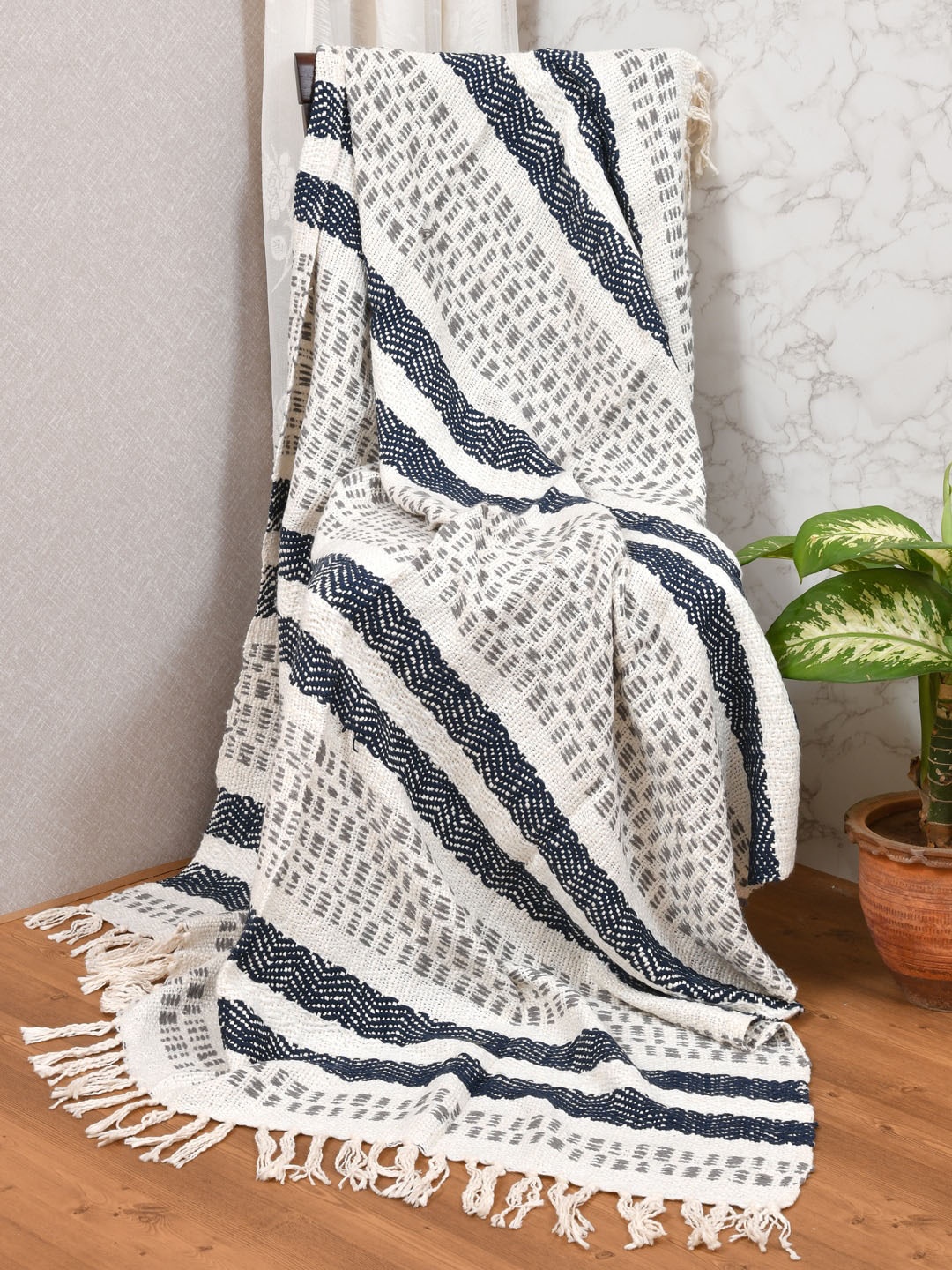 

Gulaab Jaipur White & Grey Self-Design Cotton Throw