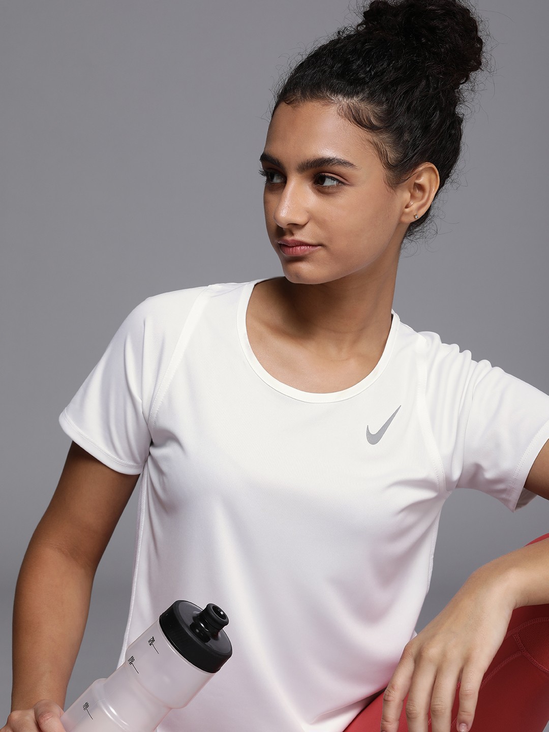 

Nike Women Dri-Fit Solid Round Neck Running T-shirt, White