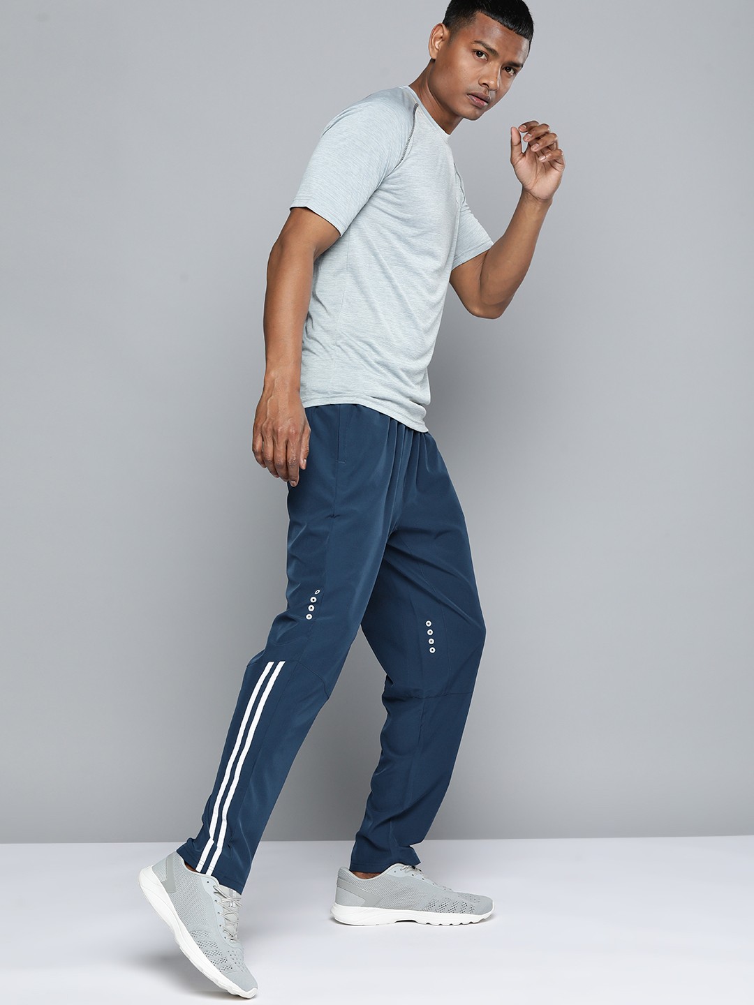 

HRX by Hrithik Roshan Men Striped Running Track Pants, Blue