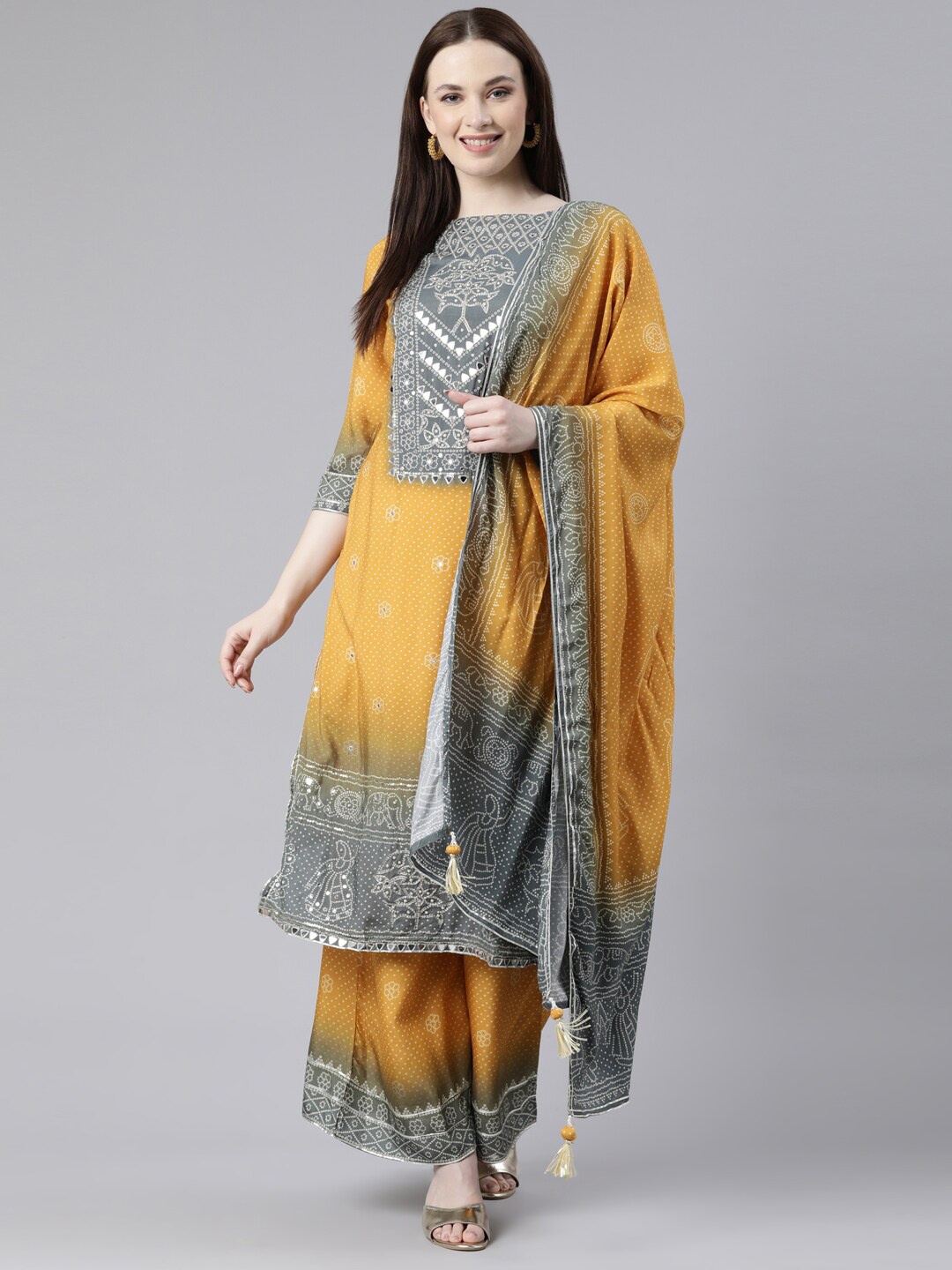 

Neerus Ethnic Motifs Printed Boat Neck Mirror Work Kurta With Palazzos & Dupatta, Mustard