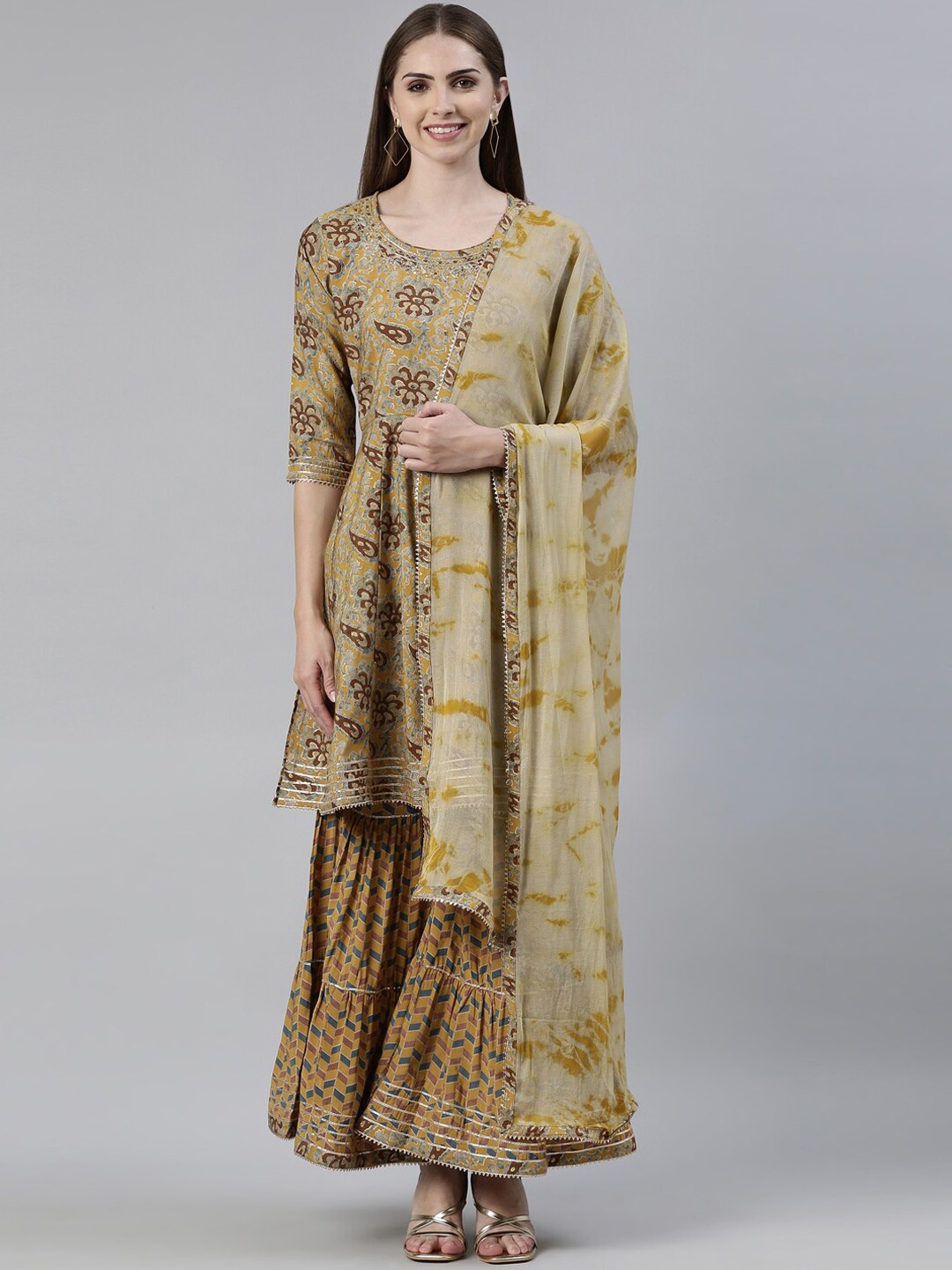 

Neerus Ethnic Motifs Printed Beads and Stones Work Kurta with Sharara & Dupatta, Mustard