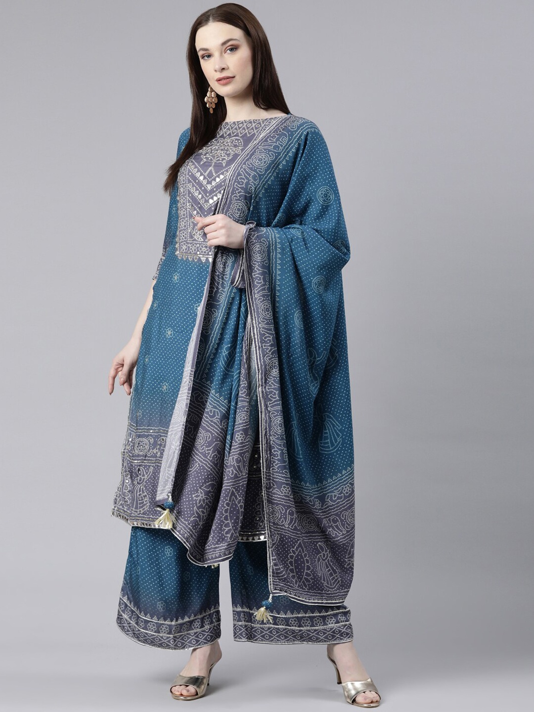 

Neerus Bandhani Printed Boat Neck Mirror Work Kurta With Palazzos & Dupatta, Blue