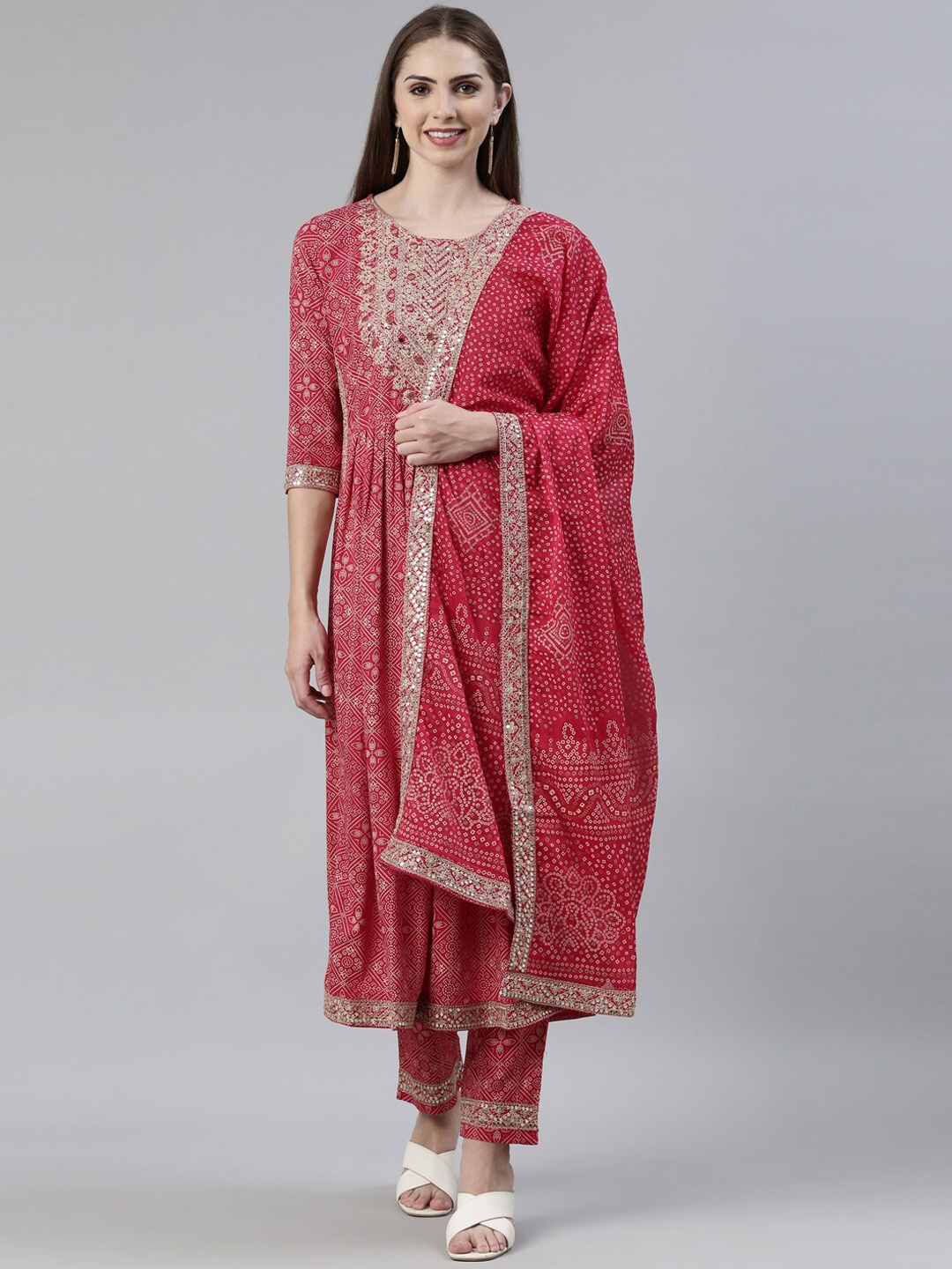 

Neerus Bandhani Printed Mirror Work Kurta With Trousers & Dupatta, Red
