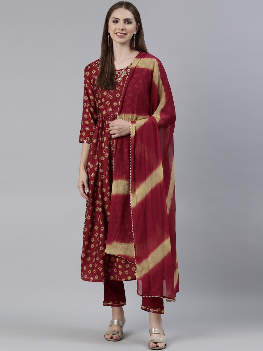 

Neerus Bandhani Printed Thread Work A-Line Kurta With Trousers & Dupatta, Magenta