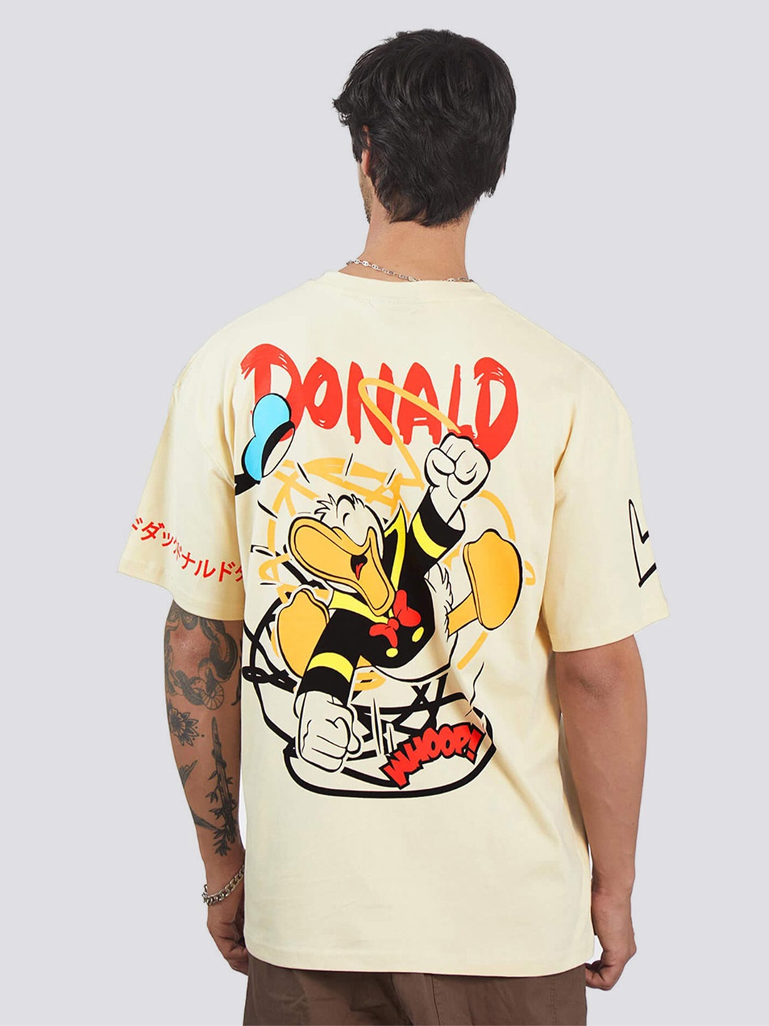 

Bonkers Corner Donald Duck Printed Drop-Shoulder Sleeves Cotton T-shirt, Off white