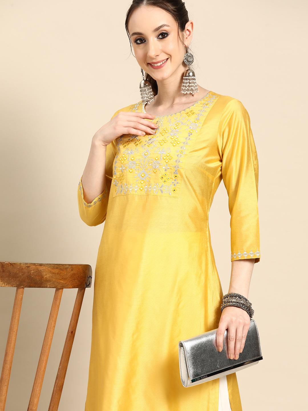 

Sangria Women Ethnic Motifs Embroidered Mirror Work Pastels Kurta, Mustard