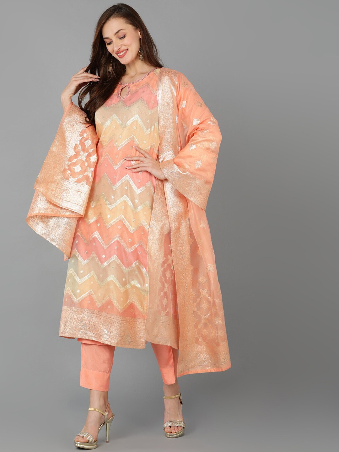 

AHIKA Chevron Printed Keyhole Neck Zari A-Line Kurta with Trousers & Dupatta, Peach