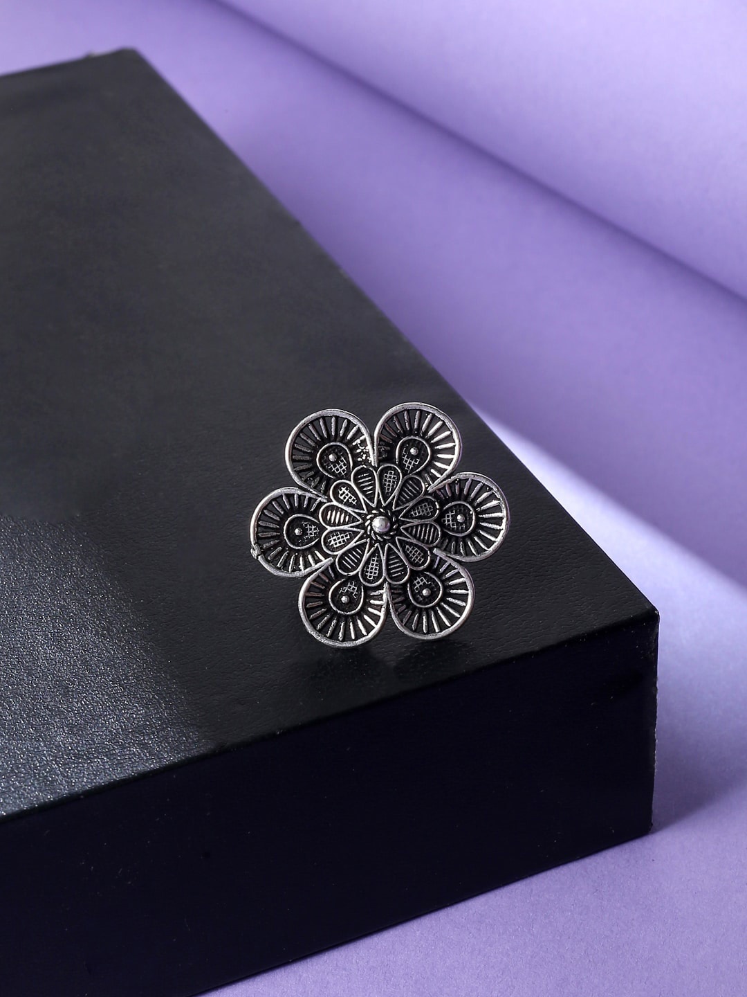 

VIRAASI Silver-Plated Floral Oxidised Adjustable Finger Ring