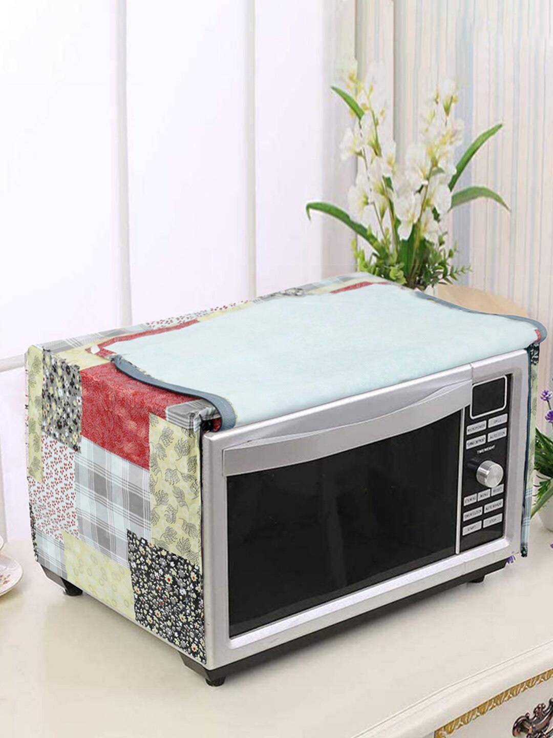 

Kuber Industries White & Black Printed Microwave Oven Cover 25 Ltr