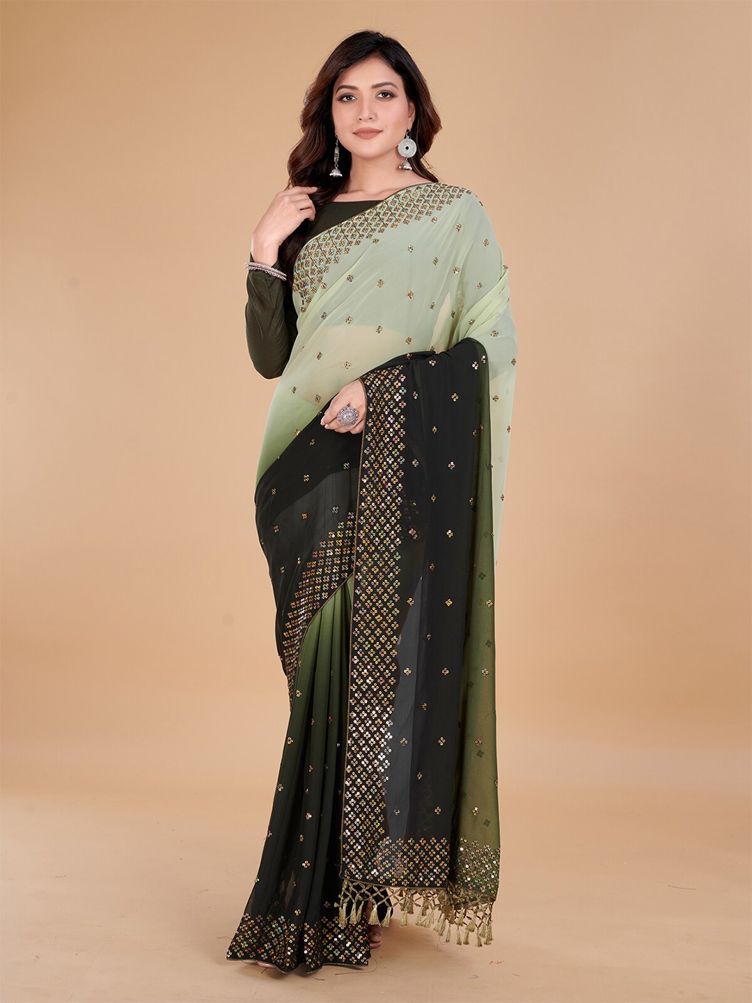 

Granthva Fab Embellished Sequinned Pure Georgette Saree, Green