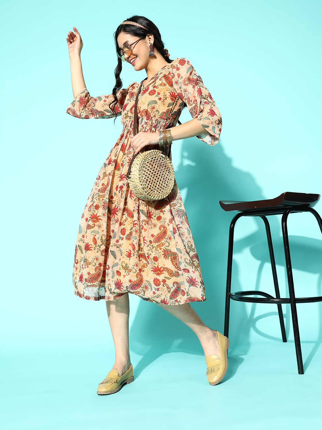 

Sangria Mustard Yellow & Red Ethnic Motifs Print Georgette Fit & Flare Midi Ethnic Dress