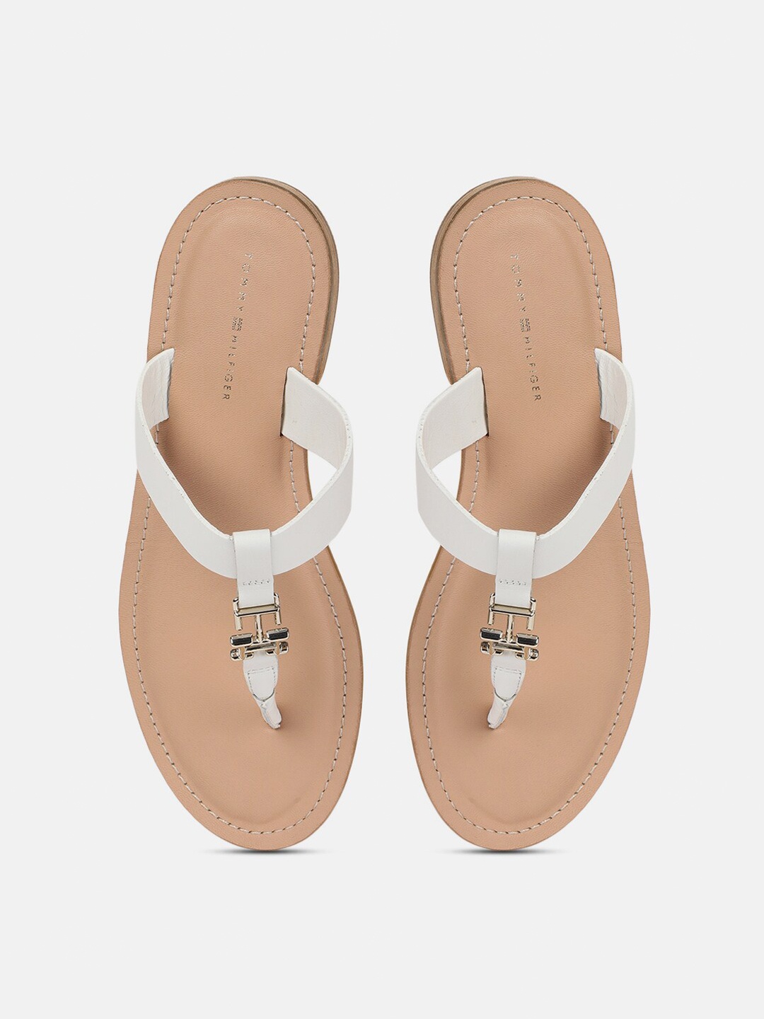 

Tommy Hilfiger Buckle Embellished Leather T-Strap Flats, Beige