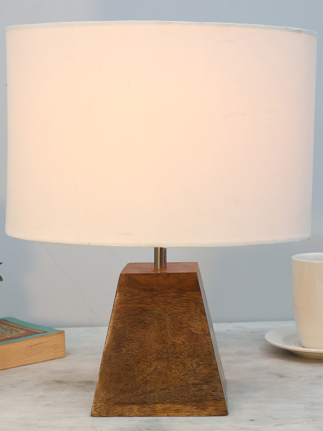 

Homesake White & Brown Pyramid Shaped Wooden Table Lamp With Oval Lampshade