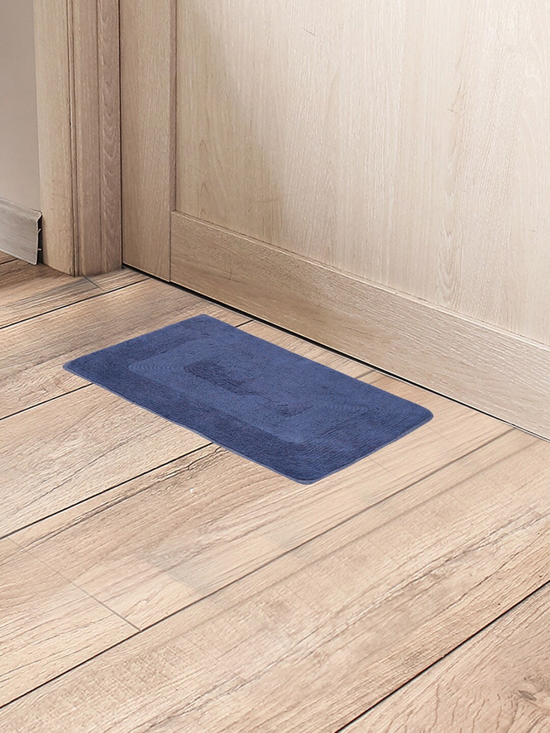 

Black gold Navy Blue Self Designed Reversible Cotton Doormat