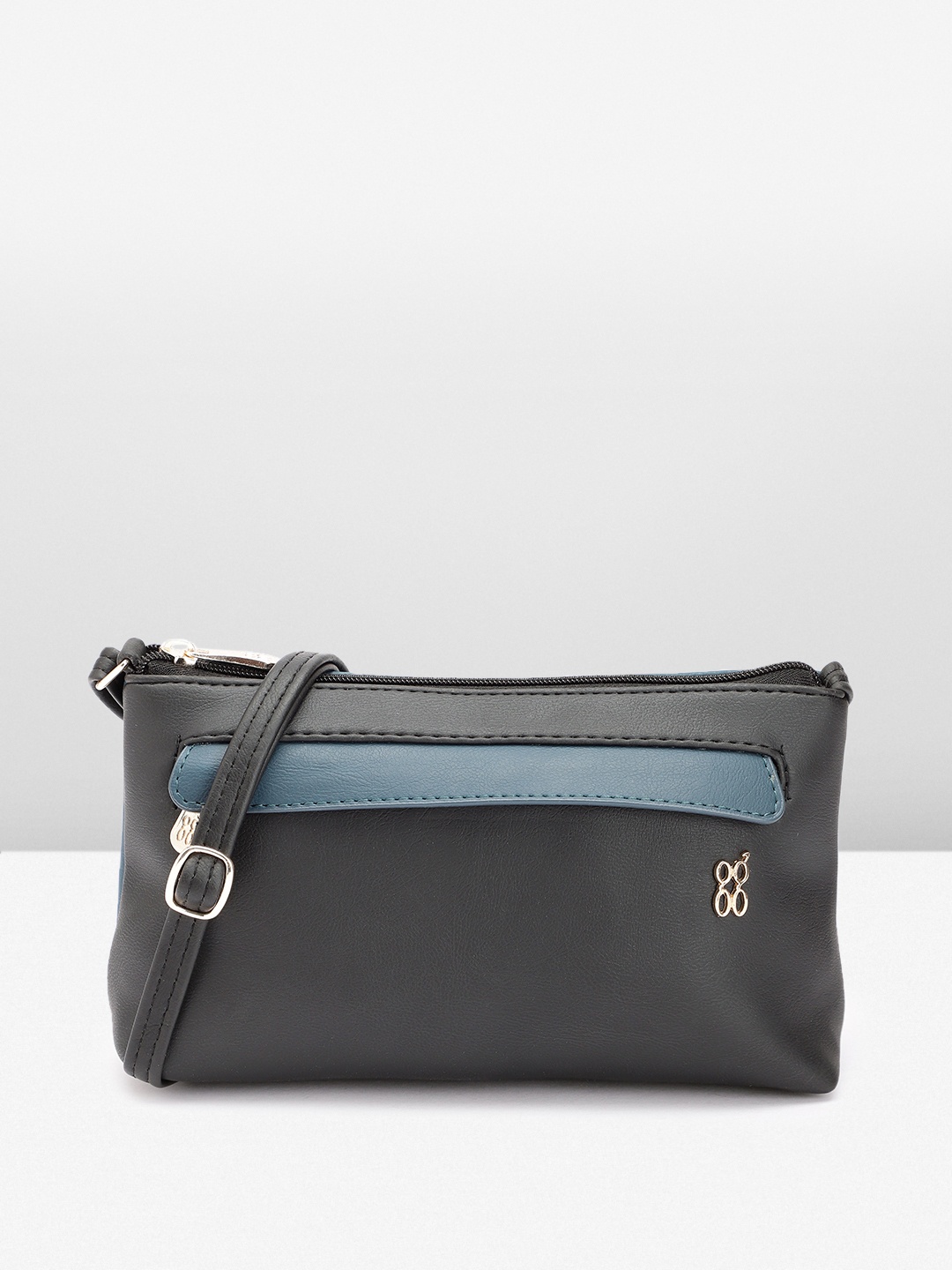 

Baggit Women Solid Sling Bag, Black