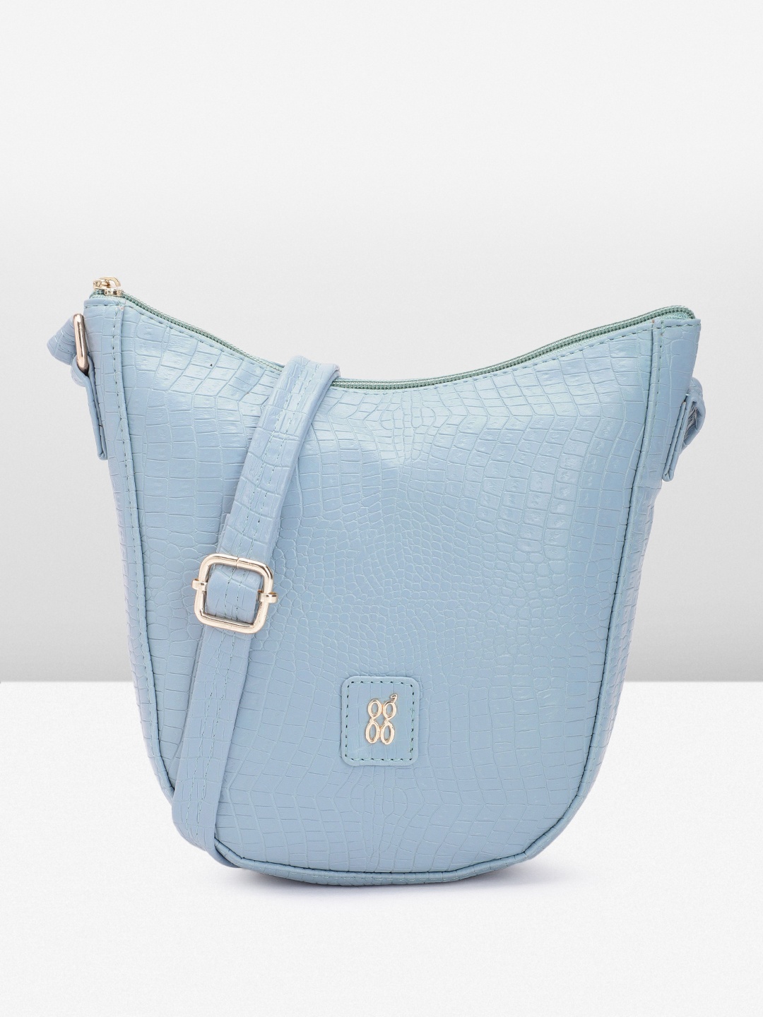 

Baggit Women Textured Sling Bag, Blue