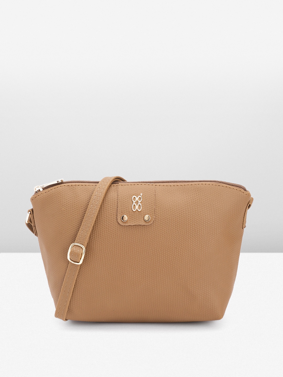 

Baggit Women Textured Sling Bag, Brown