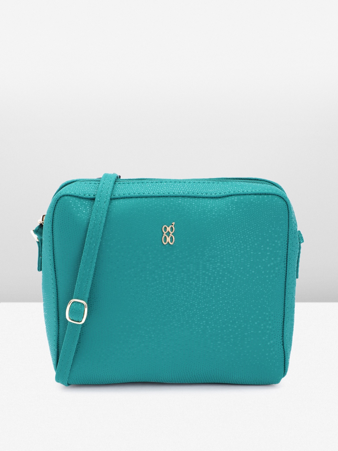 

Baggit Women Textured Sling Bag, Teal