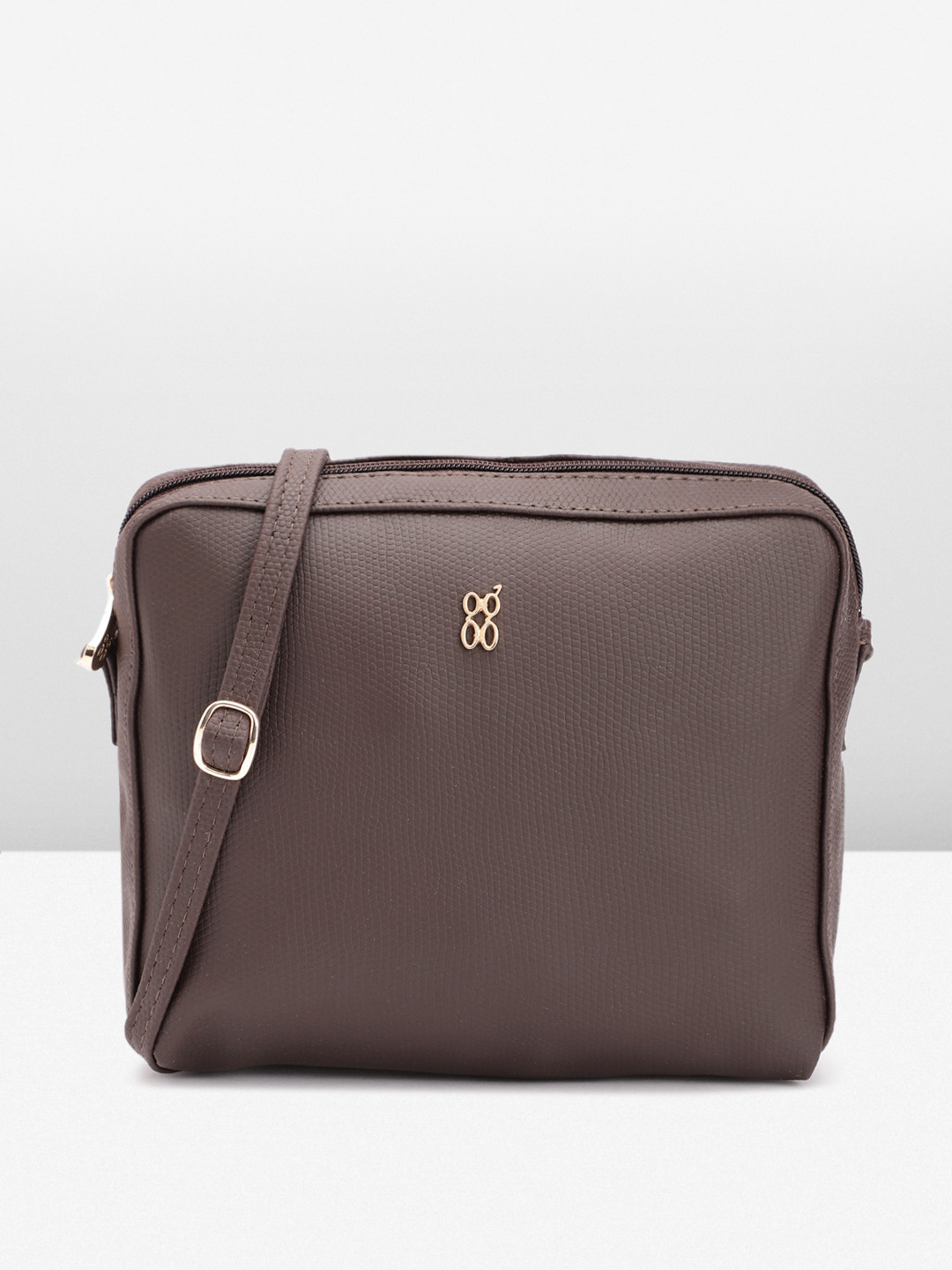 

Baggit Textured Sling Bag, Brown