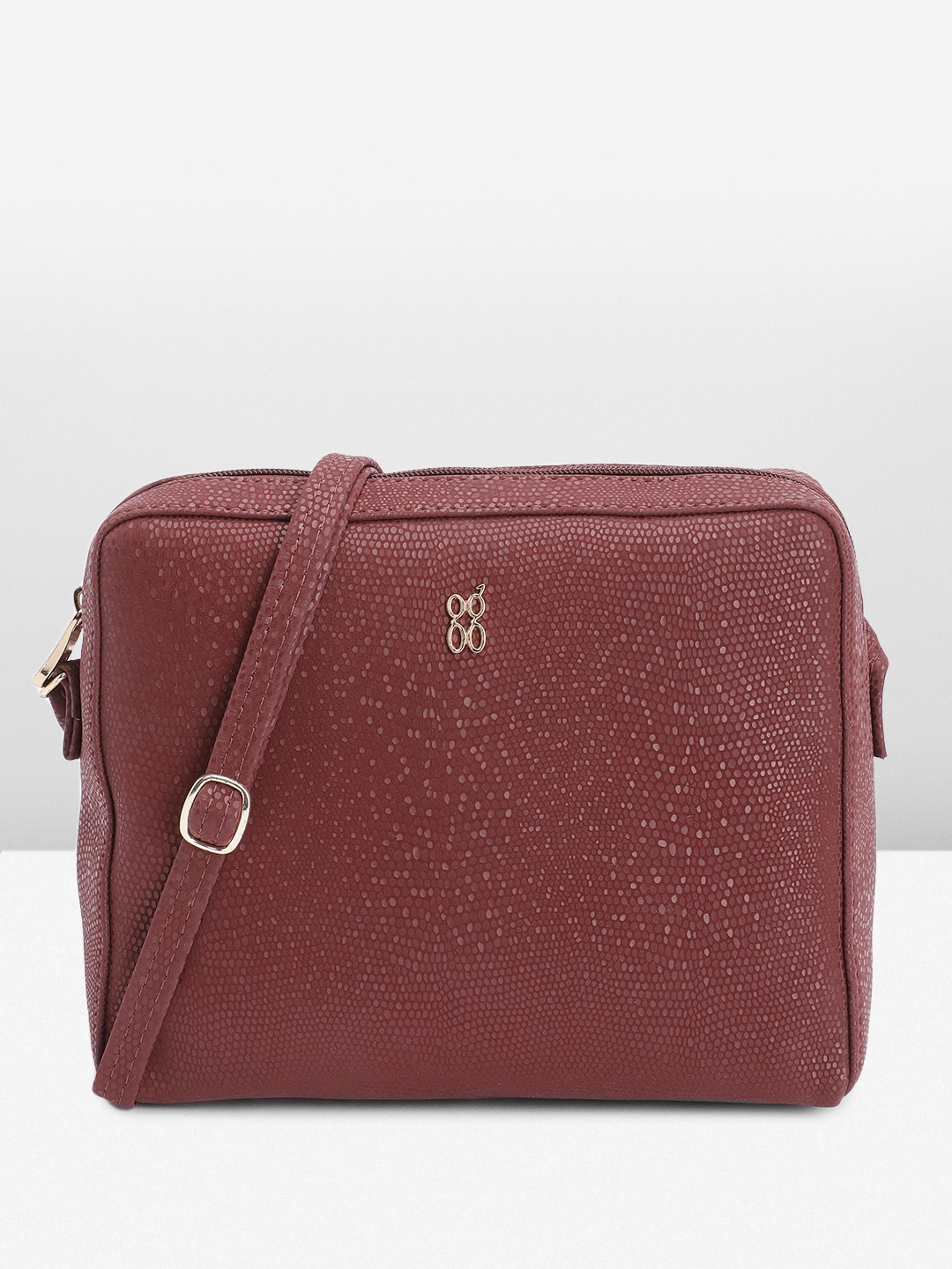 

Baggit Textured Sling Bag, Red