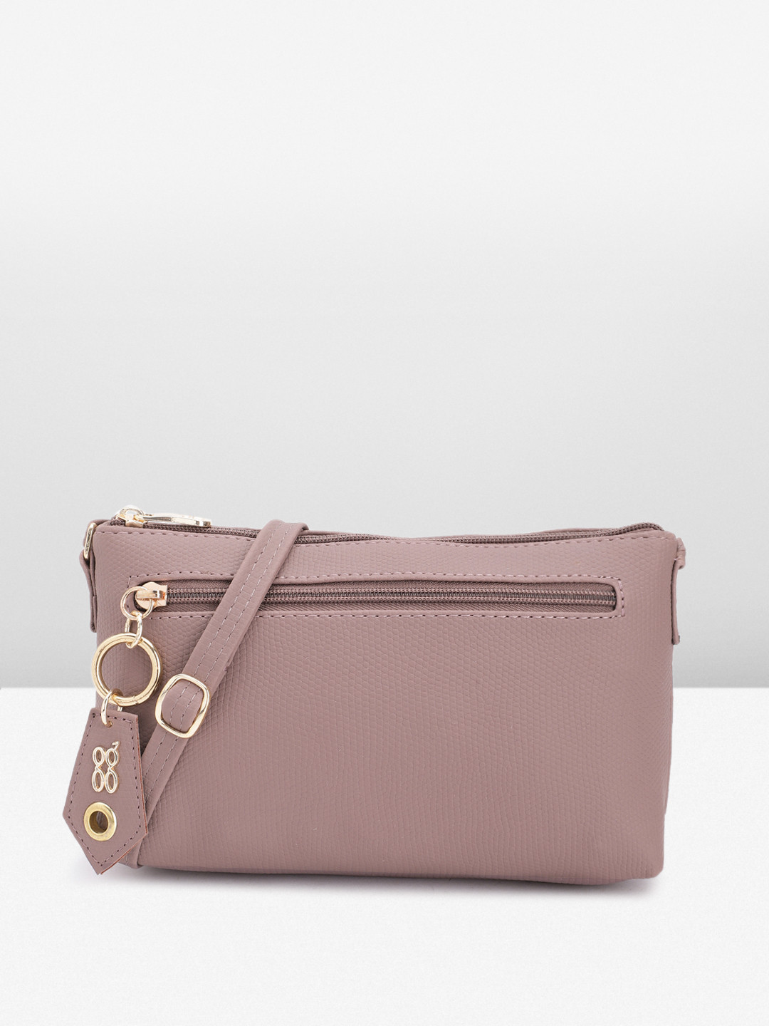 

Baggit Women Textured Sling Bag, Purple