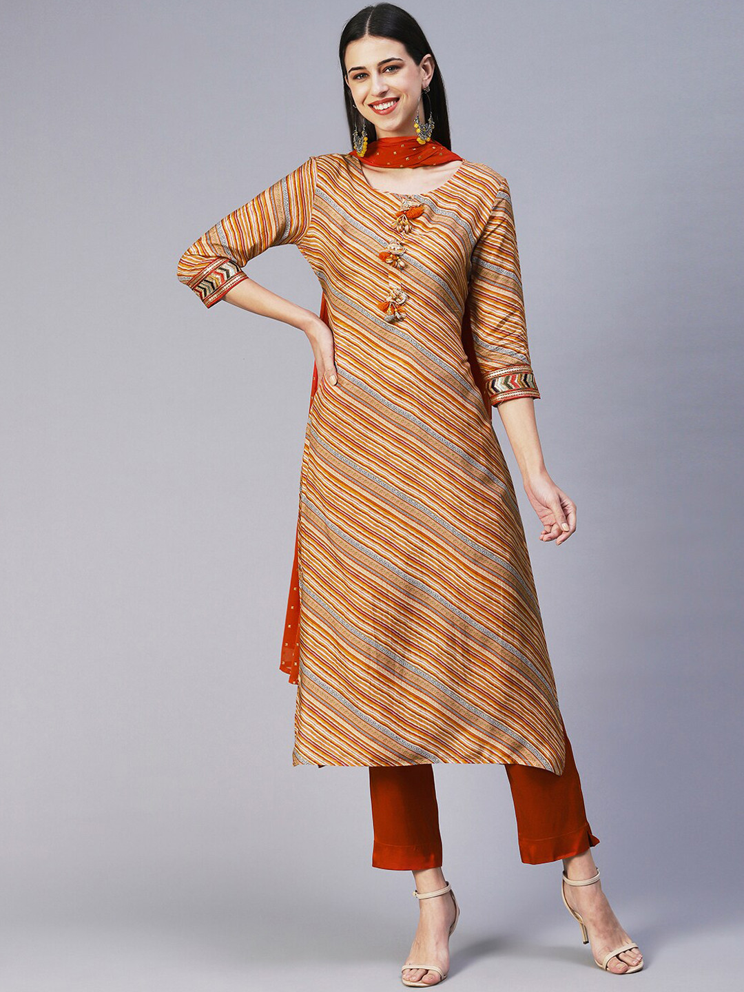 

FASHOR Leheriya Printed Kurta with Trousers & With Dupatta, Orange
