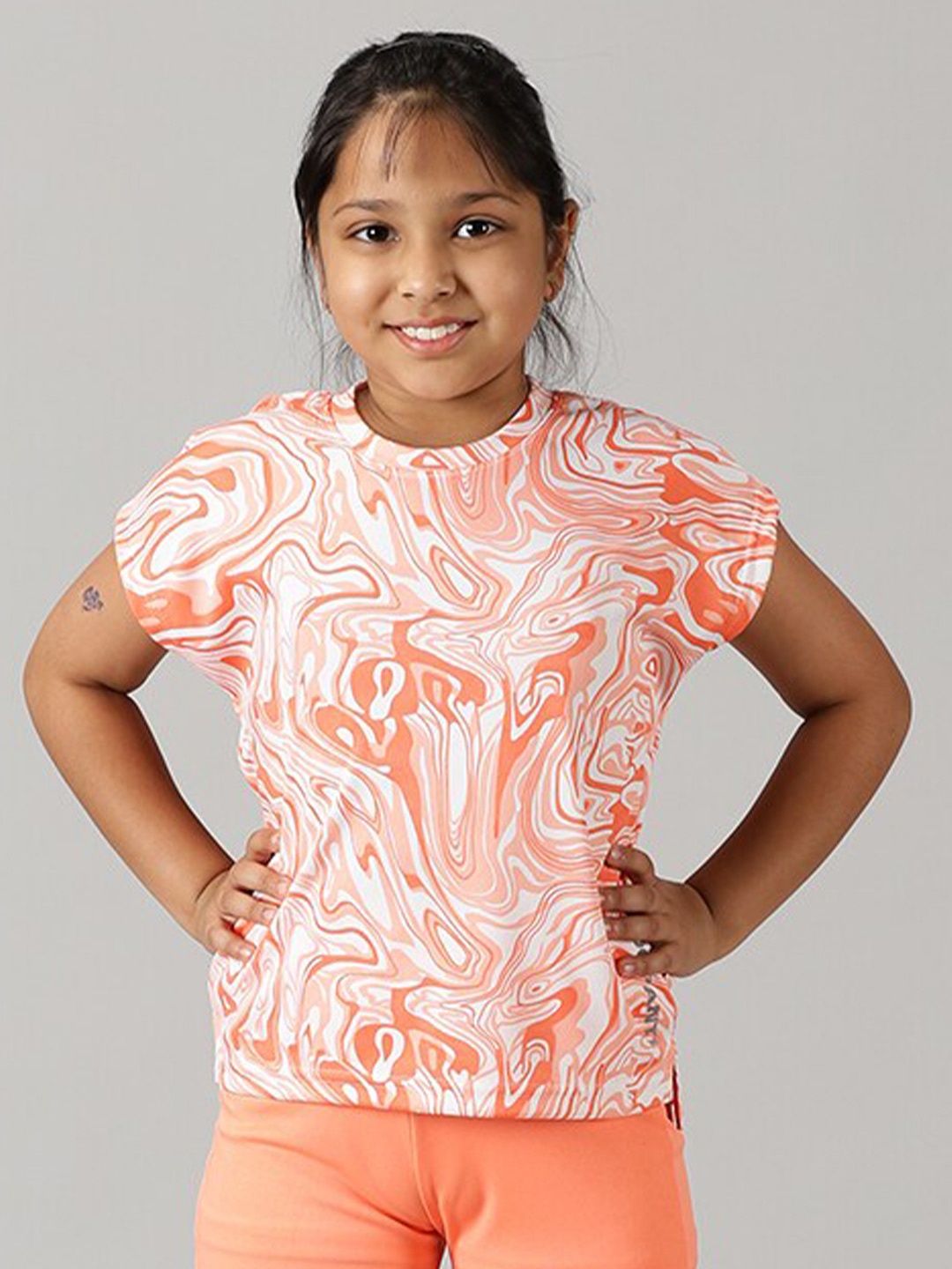 

KiddoPanti Girls Abstract printed Round Neck T-shirt, Peach