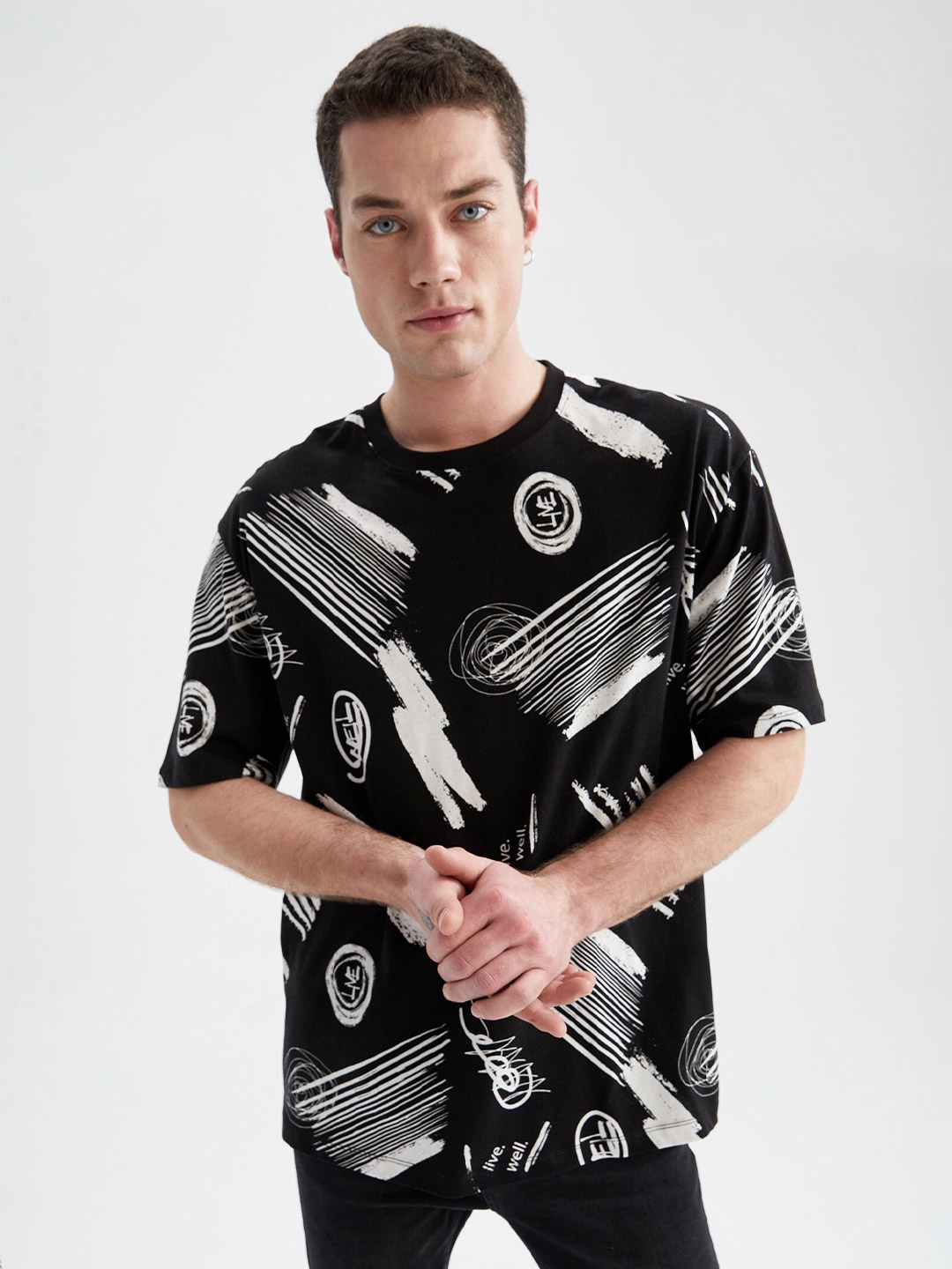 

DeFacto Abstract Printed Round Neck Pure Cotton T-shirt, Black