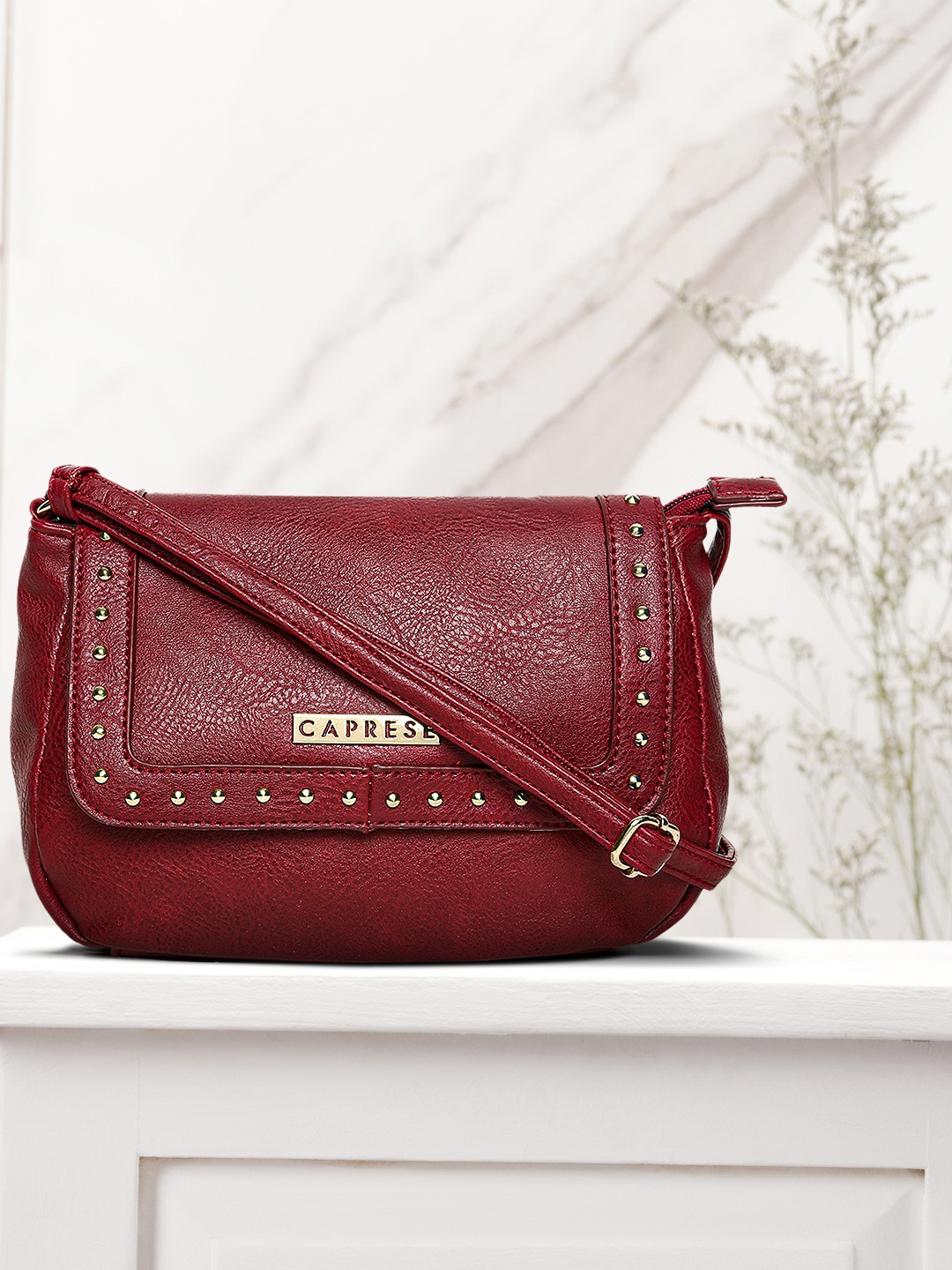 

Caprese Red Solid Sling Bag
