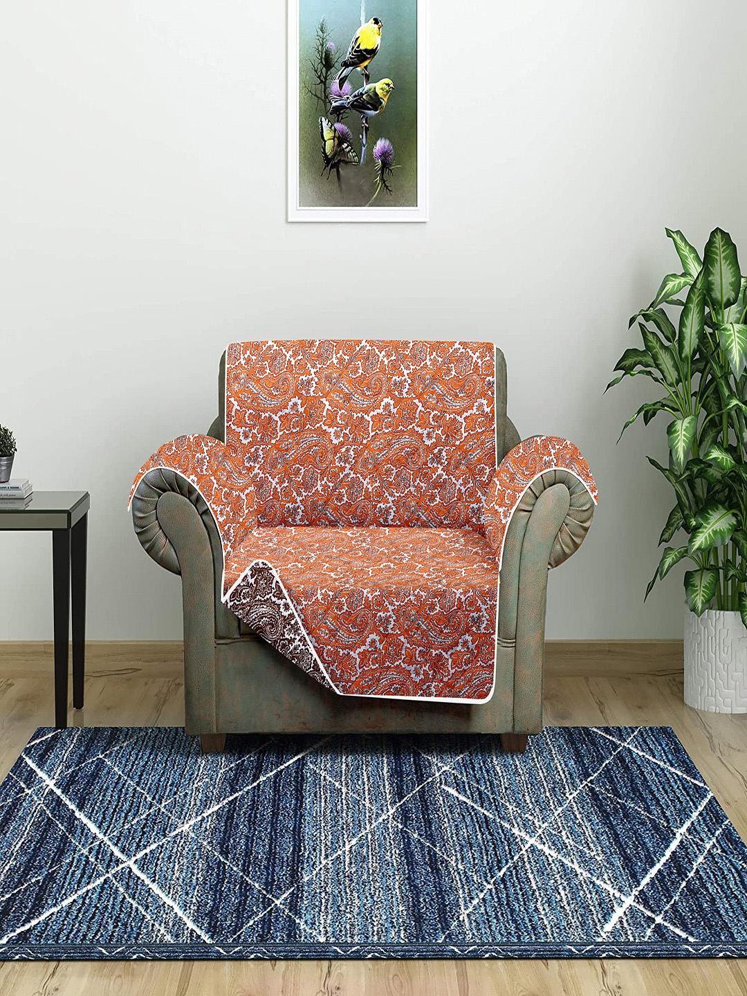

Cortina Orange & White Printed One Seater Reversible Sofa Cover With Arm