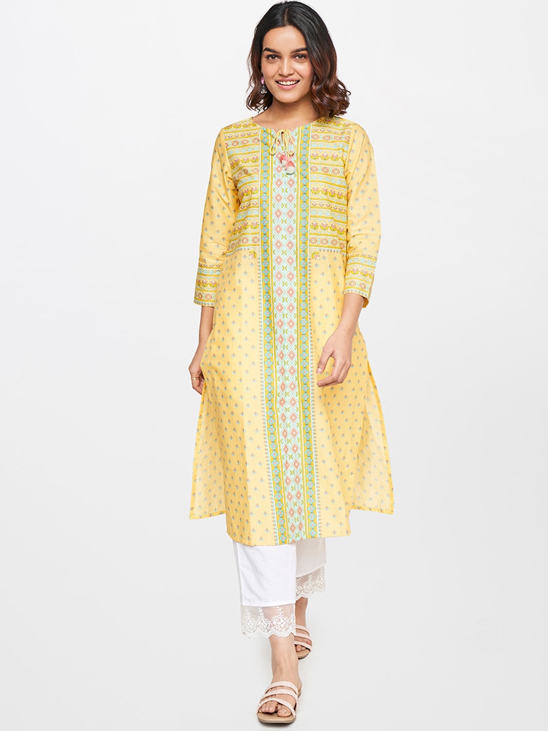 

Global Desi Geometric Printed Tie-Up Neck Pure Cotton Kurta, Yellow