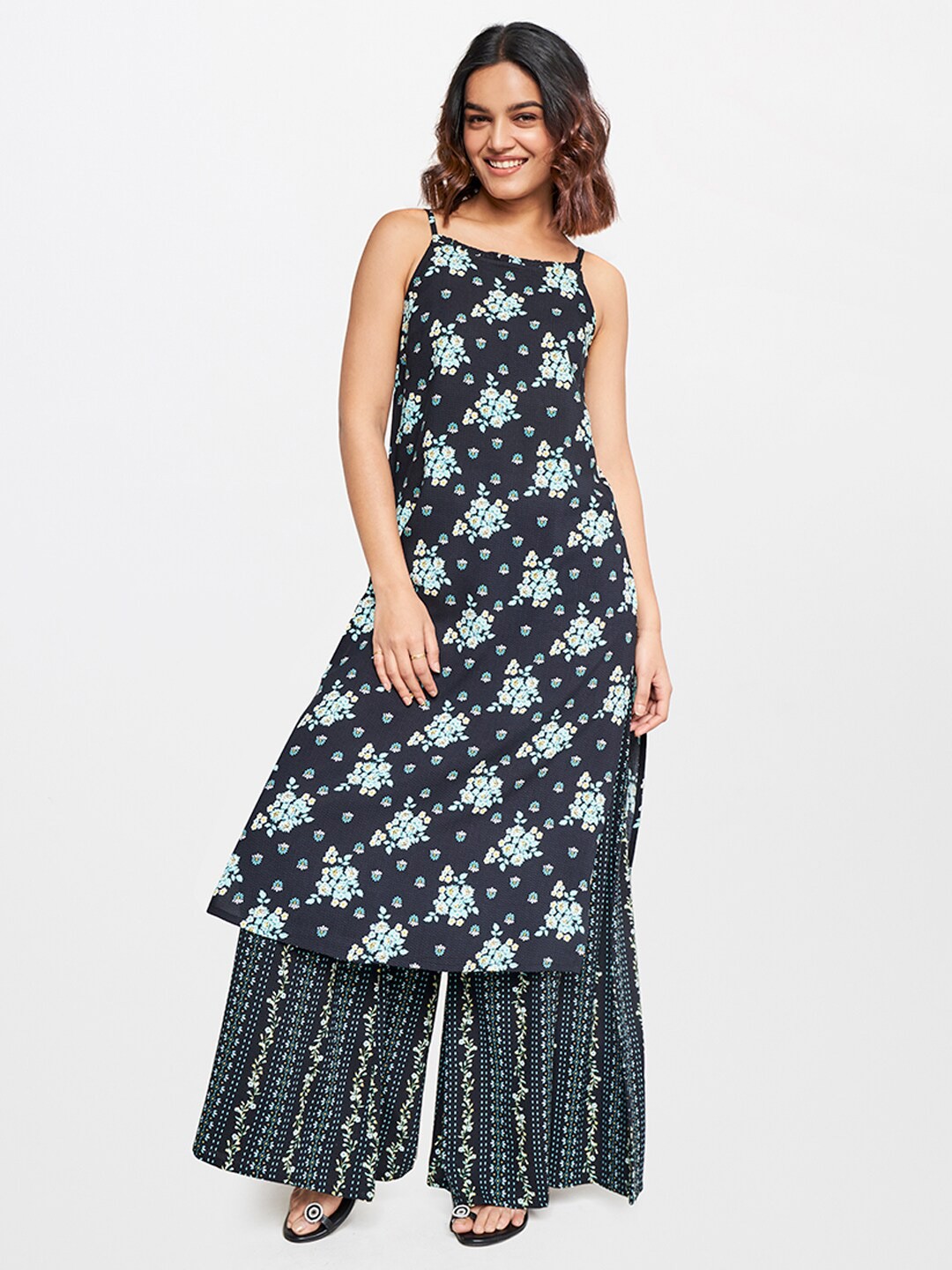 

Global Desi Sleeveless Floral Printed Regular Kurta with Palazzos, Navy blue