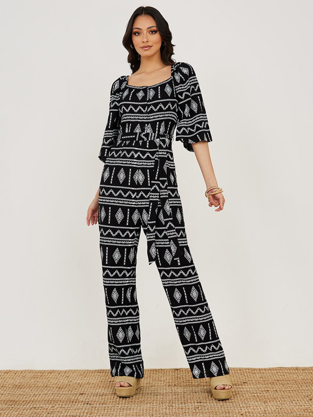 

Styli Black & White Printed Flared Sleeves Basic Jumpsuit
