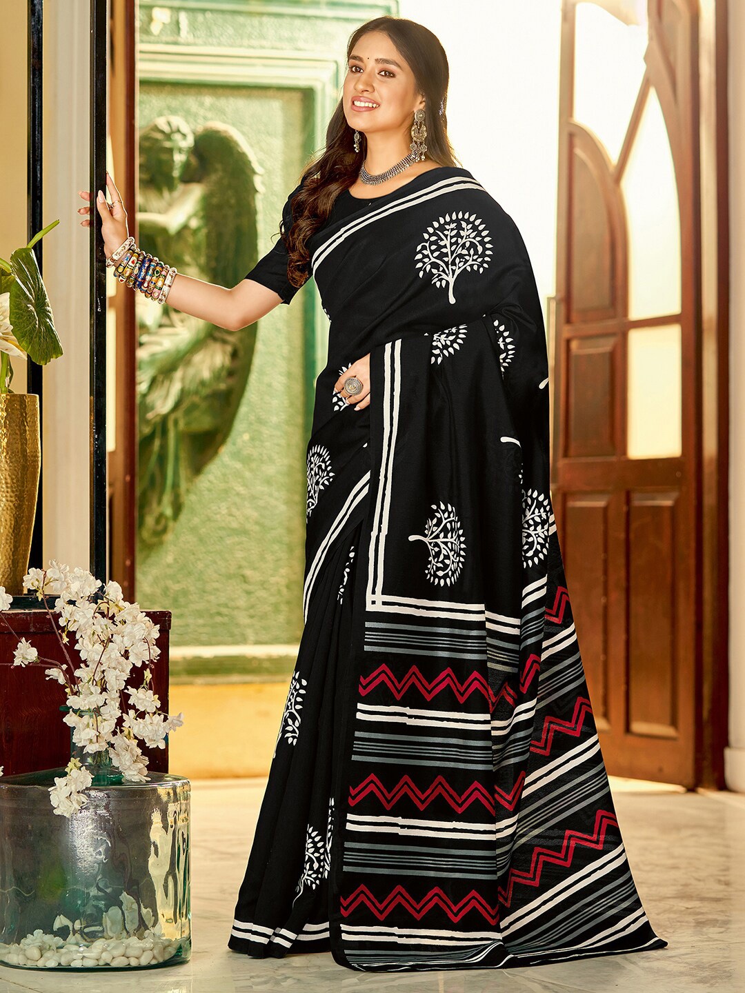 

Anouk Ethnic Motifs Printed Art Silk Dabu Saree, Black