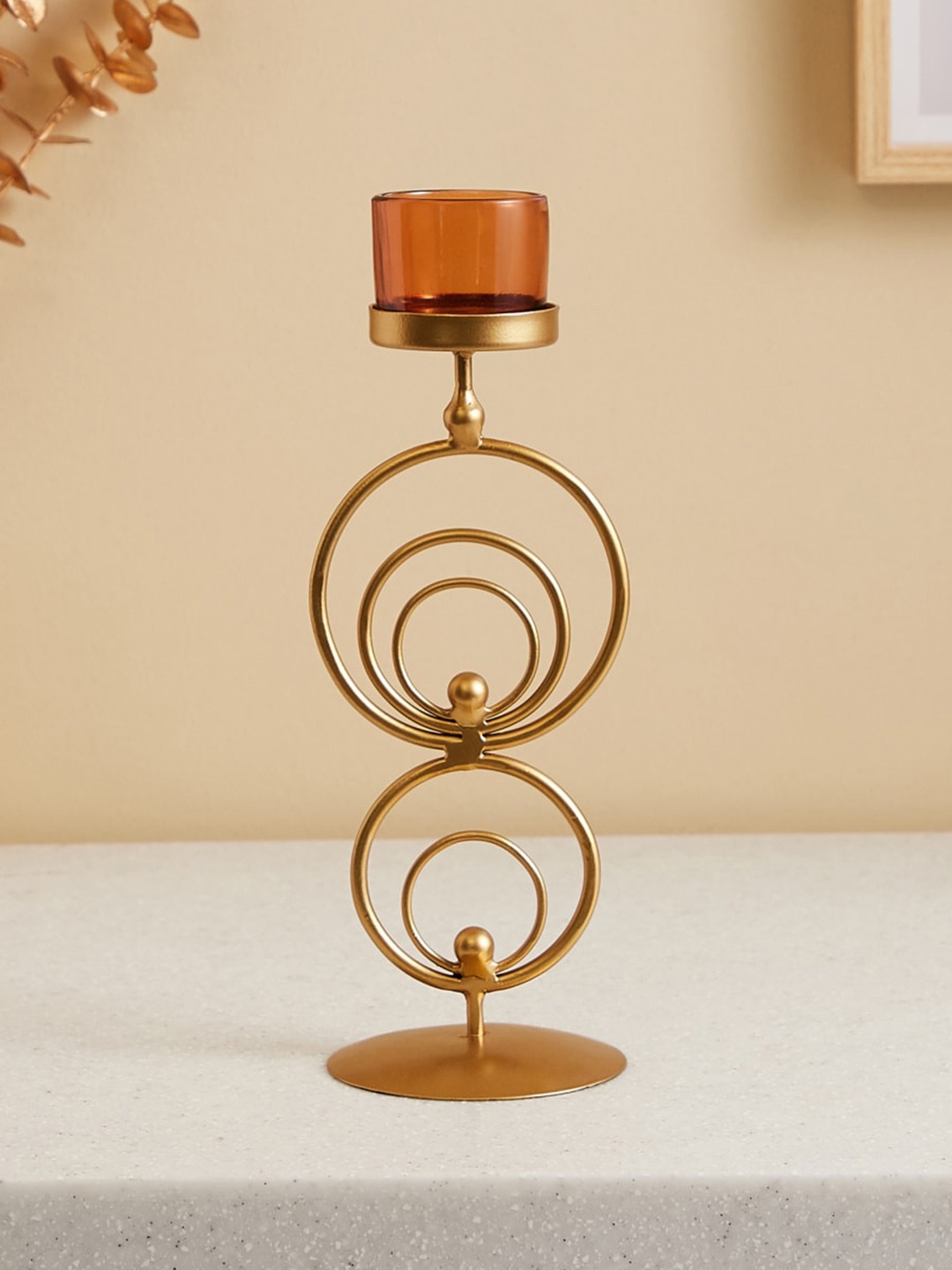 

Home Centre Gold-Toned Glass Pedestal Votive Holder