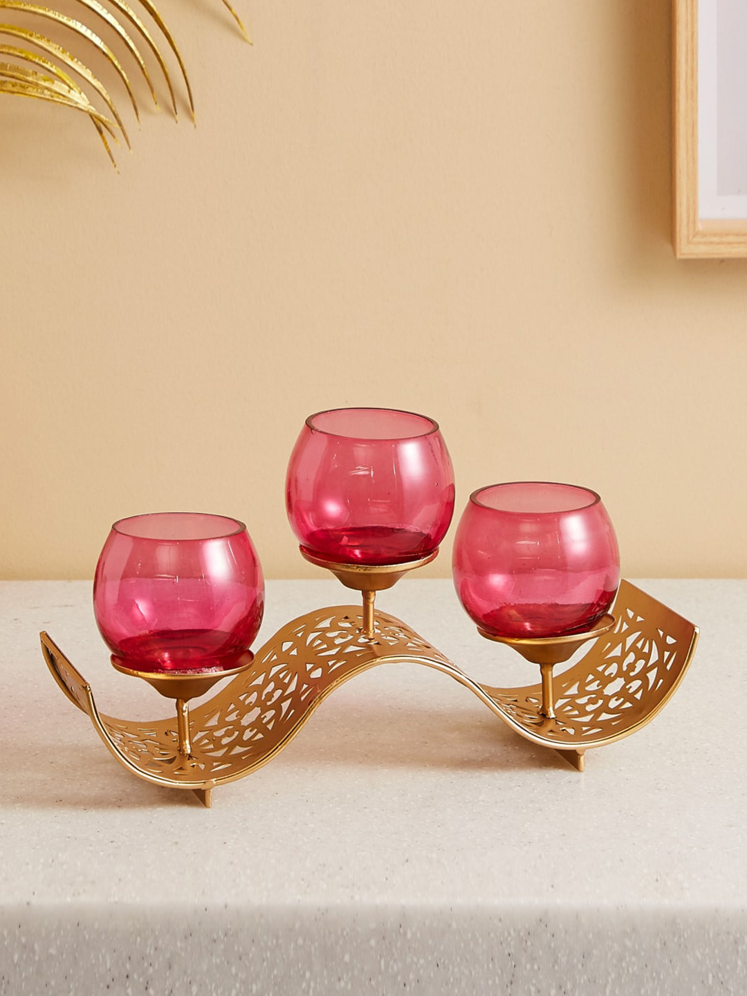 

Home Centre Rylee Pink & Gold-Toned Cut-Out Detailed Iron and Glass 3 Candle Votive Holders with Base